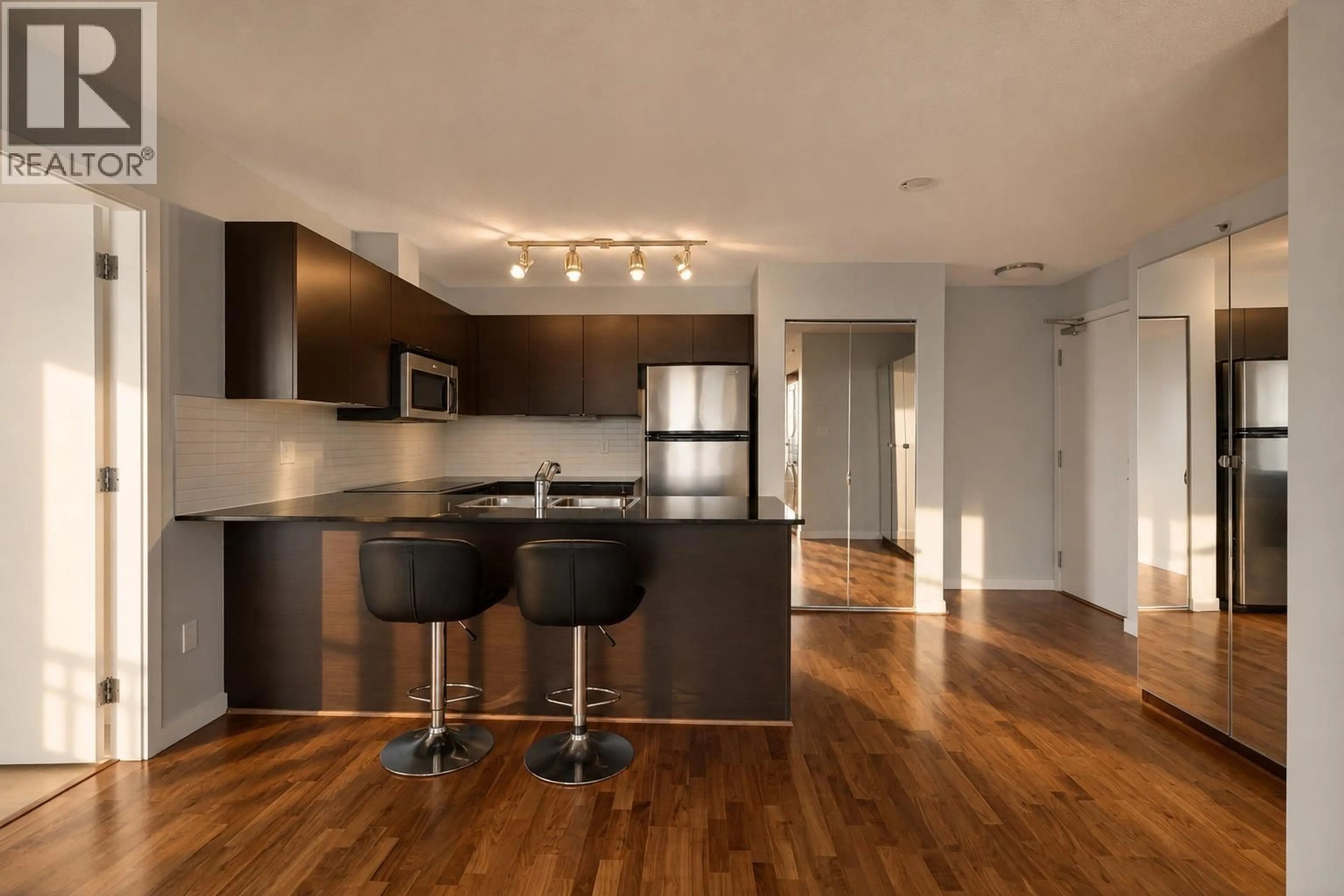 Open concept kitchen, wood/laminate floor for 1202 - 4182 DAWSON STREET, Burnaby British Columbia V5C0A2