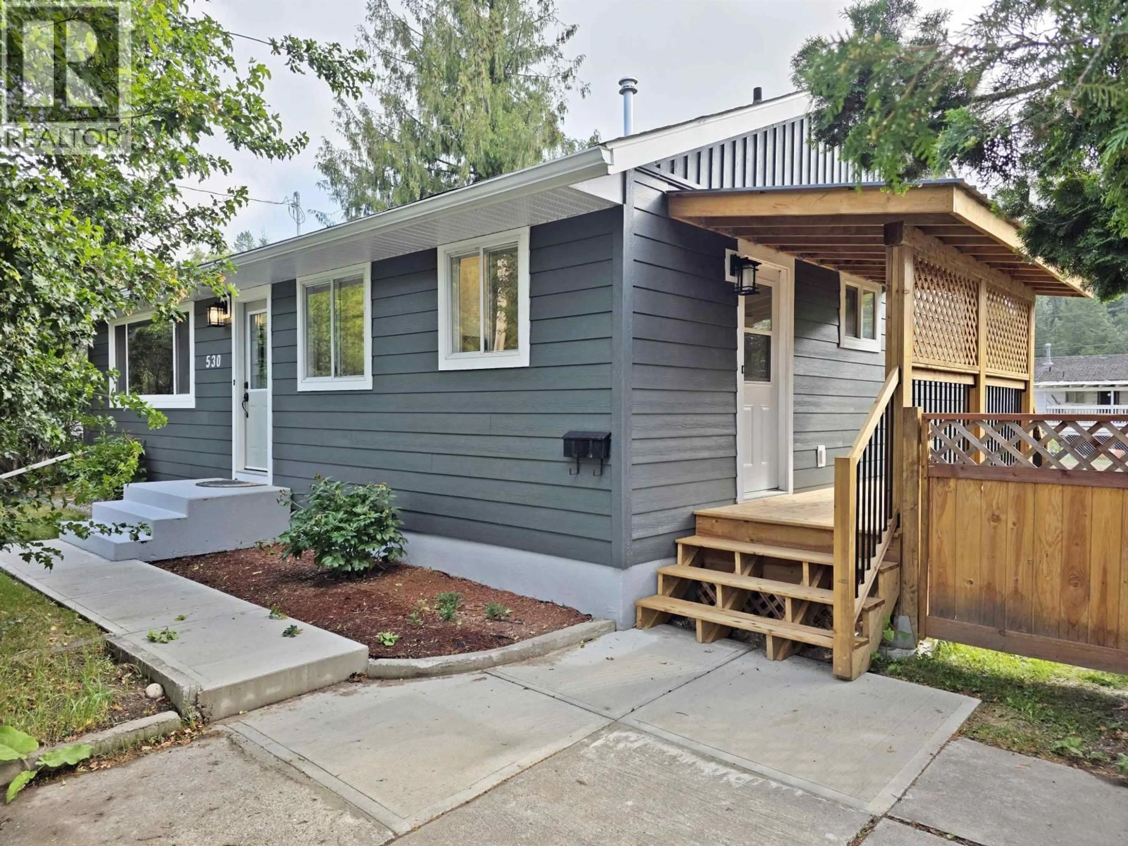 Home with vinyl exterior material, street for 530 NORMAN STREET, Quesnel British Columbia V2J3A4