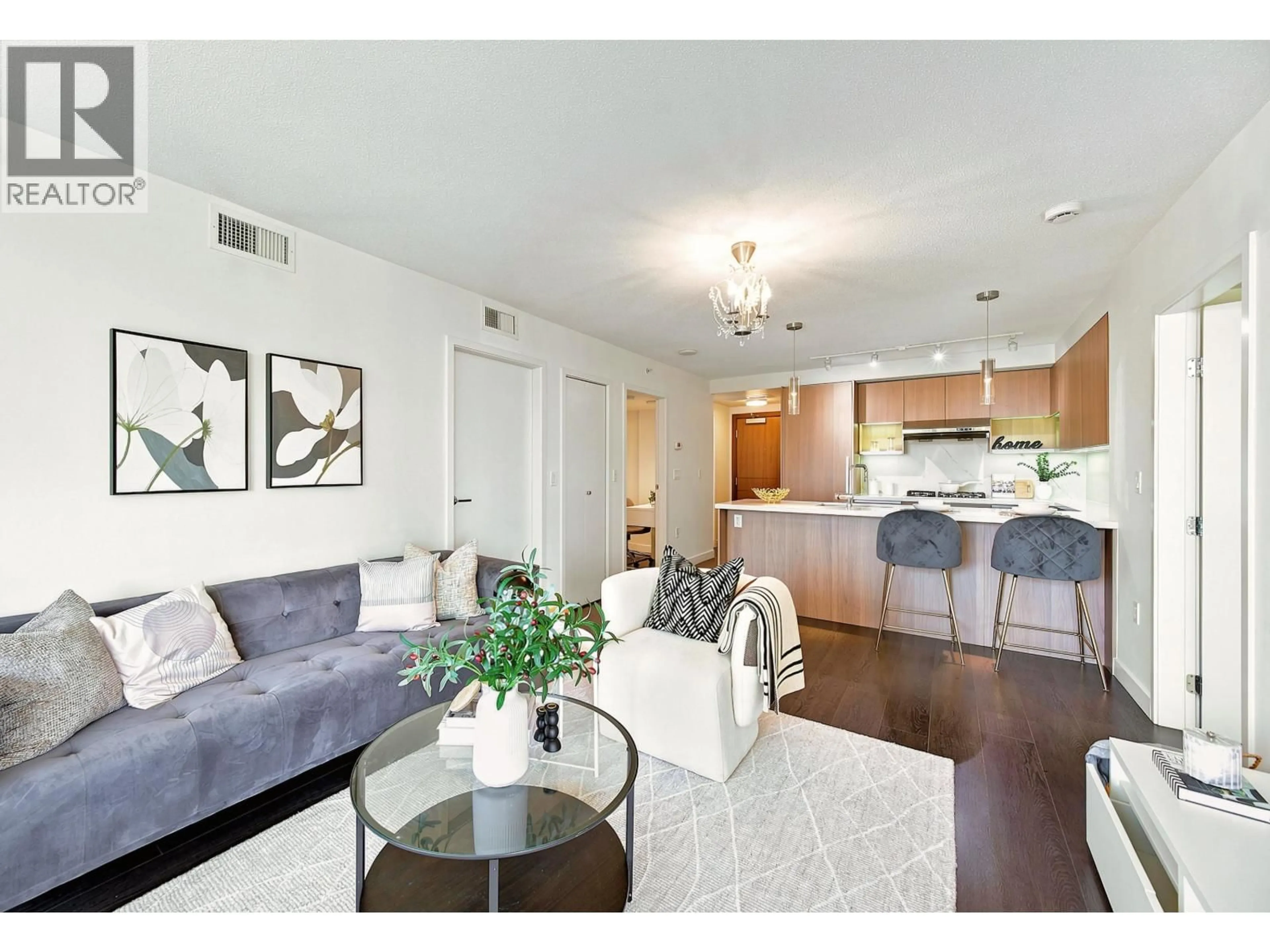 Living room with furniture, wood/laminate floor for 1007 - 3131 KETCHESON ROAD, Richmond British Columbia V6X0N4