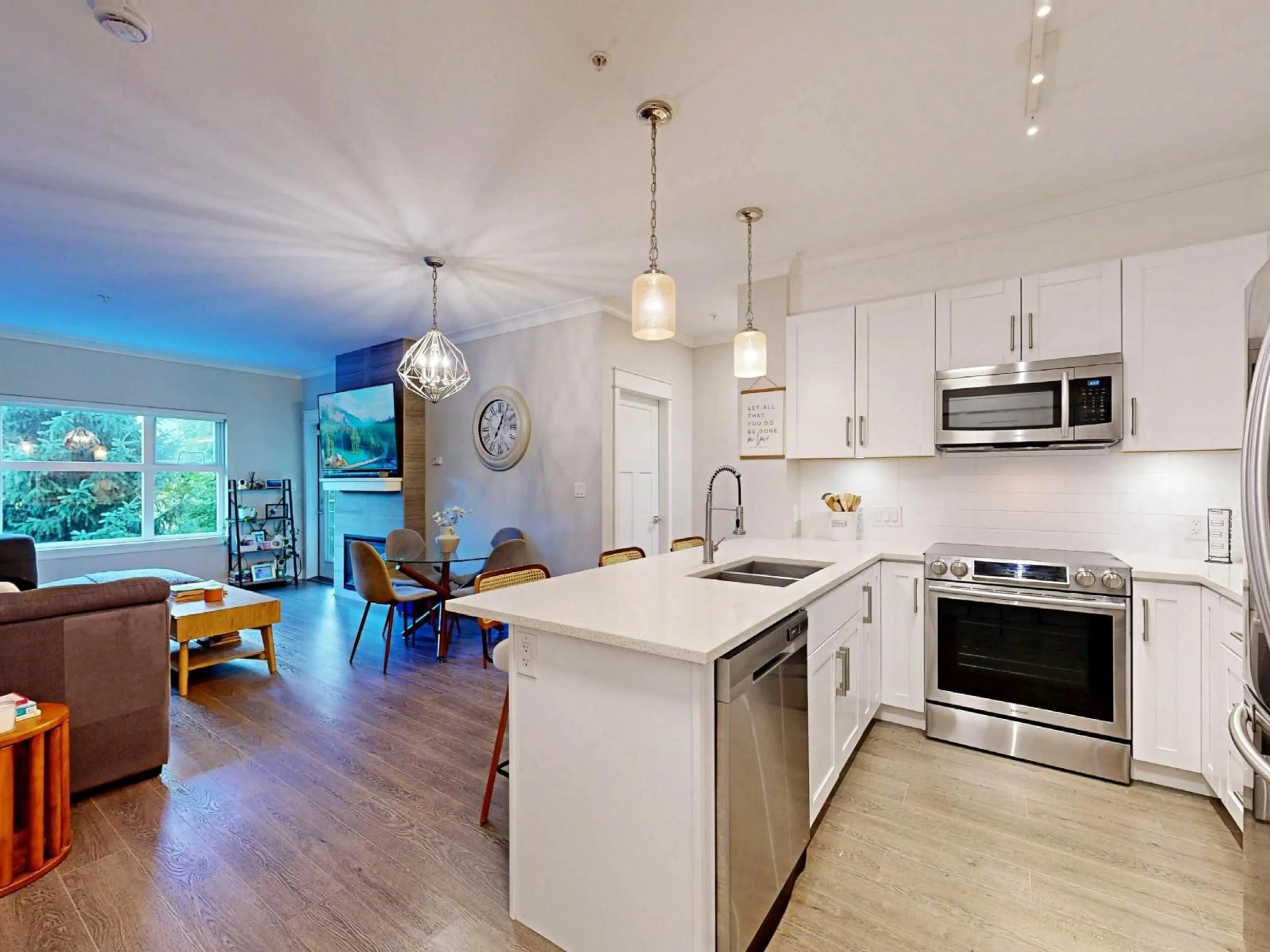 Open concept kitchen, wood/laminate floor for 211 - 5020 221A STREET, Langley British Columbia V2Y0V5