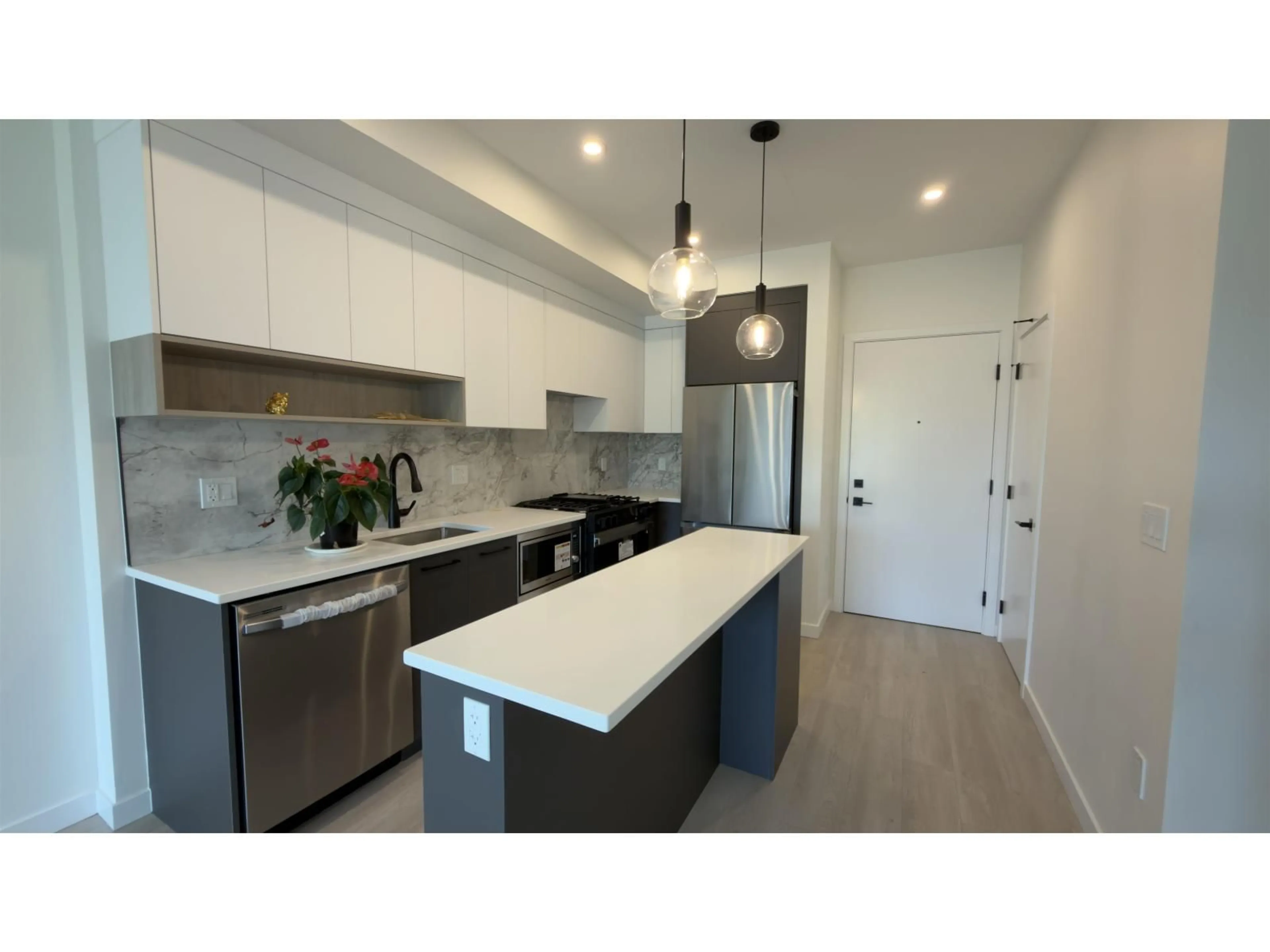 Open concept kitchen, unknown for 202 - 6270 GOOSEBERRY DRIVE, Surrey British Columbia V3S0C8