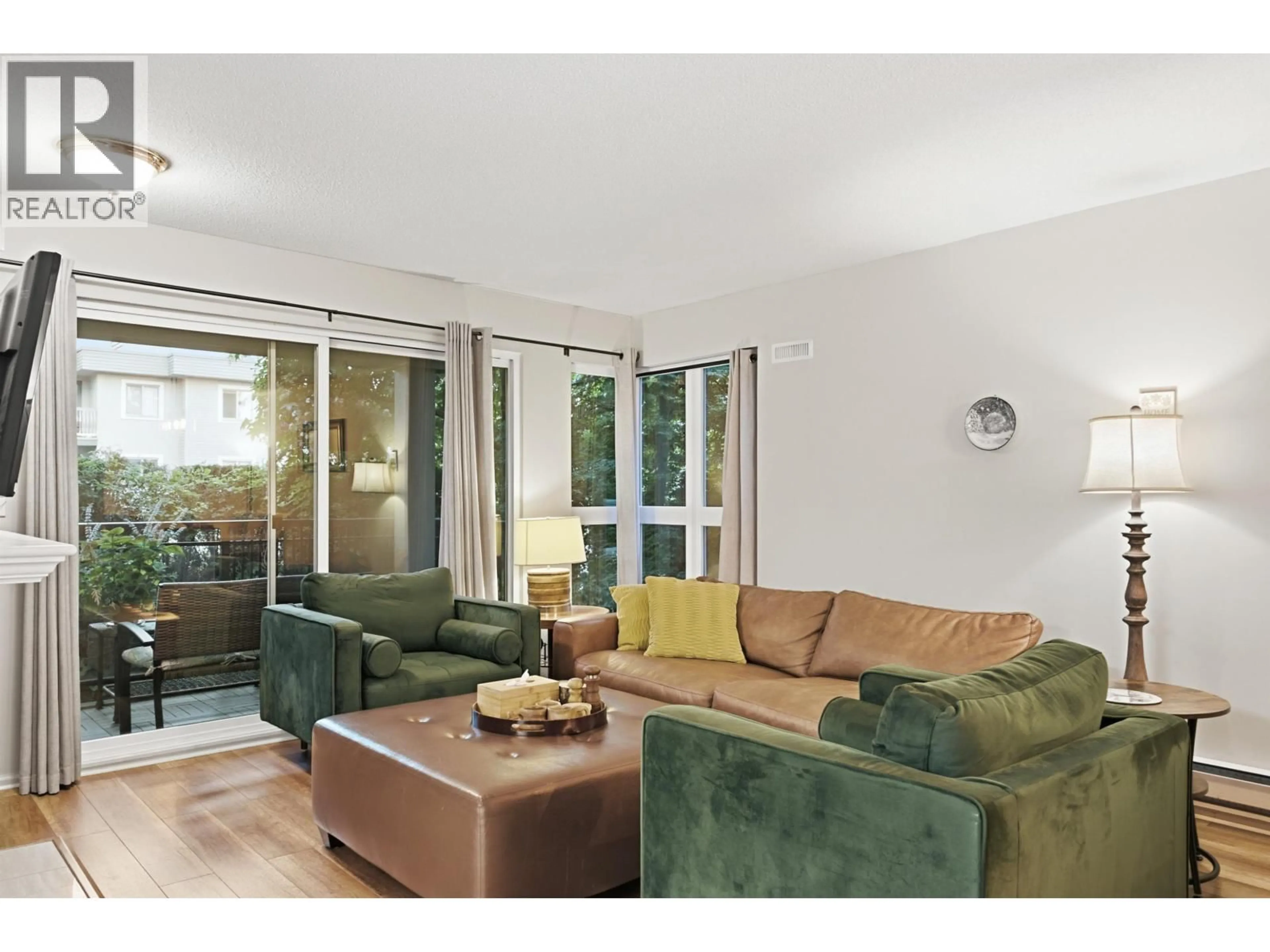 Living room with furniture, unknown for 303 - 106 KINGS ROAD, North Vancouver British Columbia V7N2L8