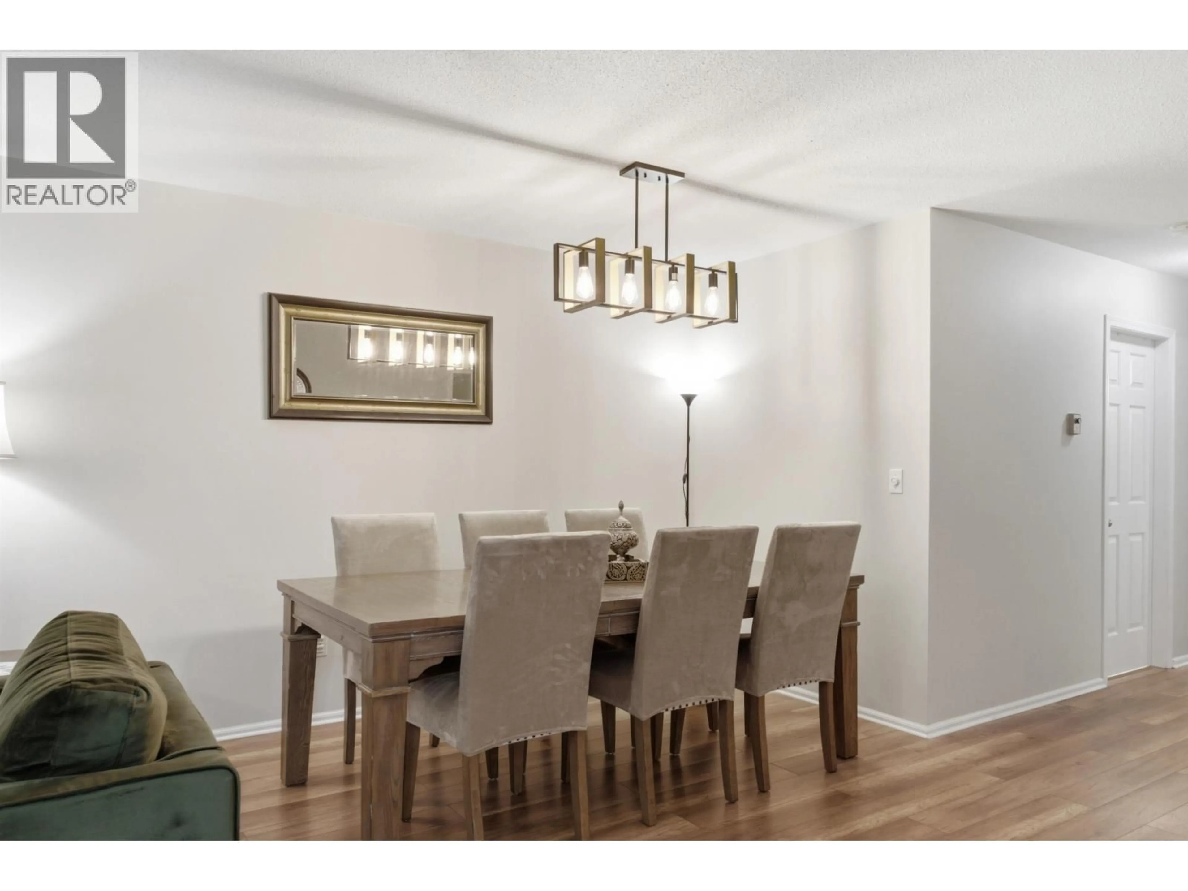 Dining room, wood/laminate floor for 303 - 106 KINGS ROAD, North Vancouver British Columbia V7N2L8