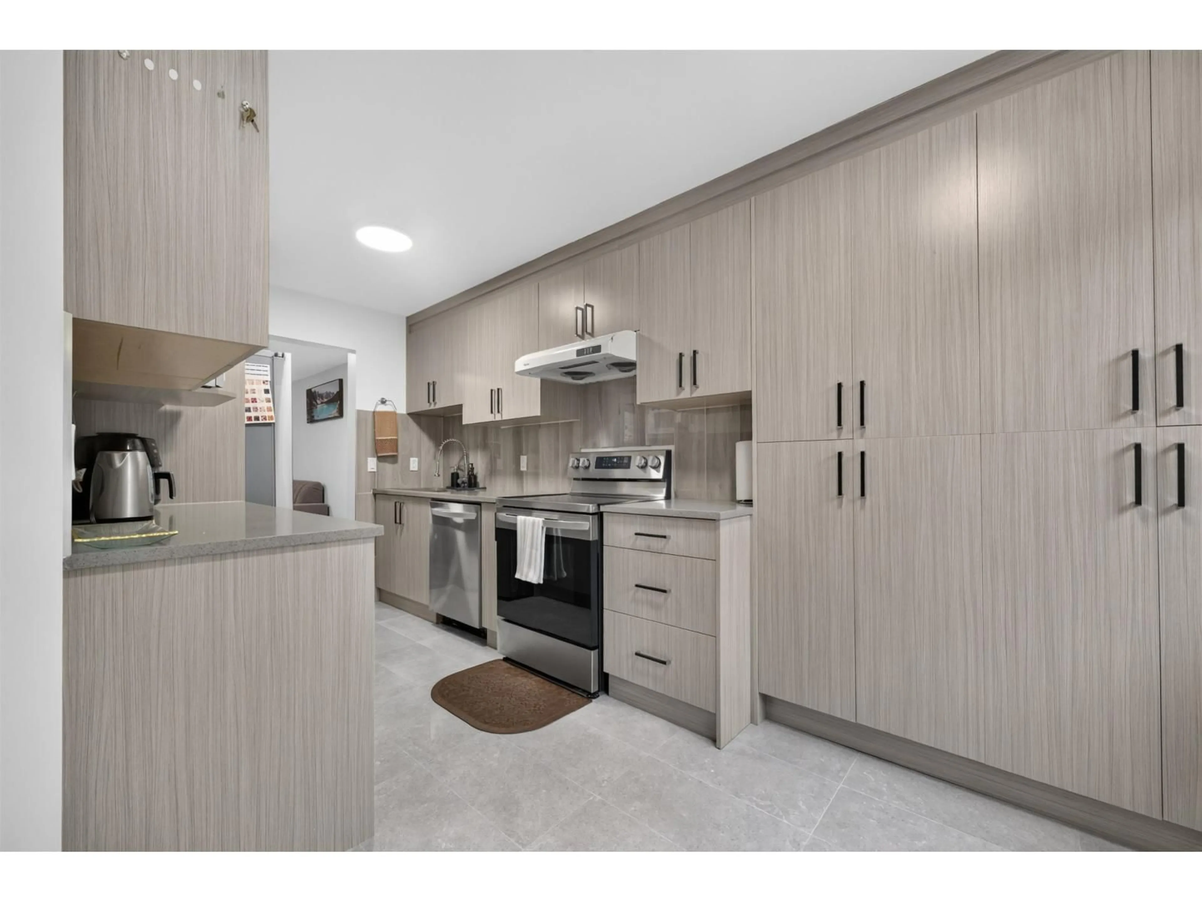 Standard kitchen, unknown for 121 - 9467 PRINCE CHARLES BOULEVARD, Surrey British Columbia V3V7G1