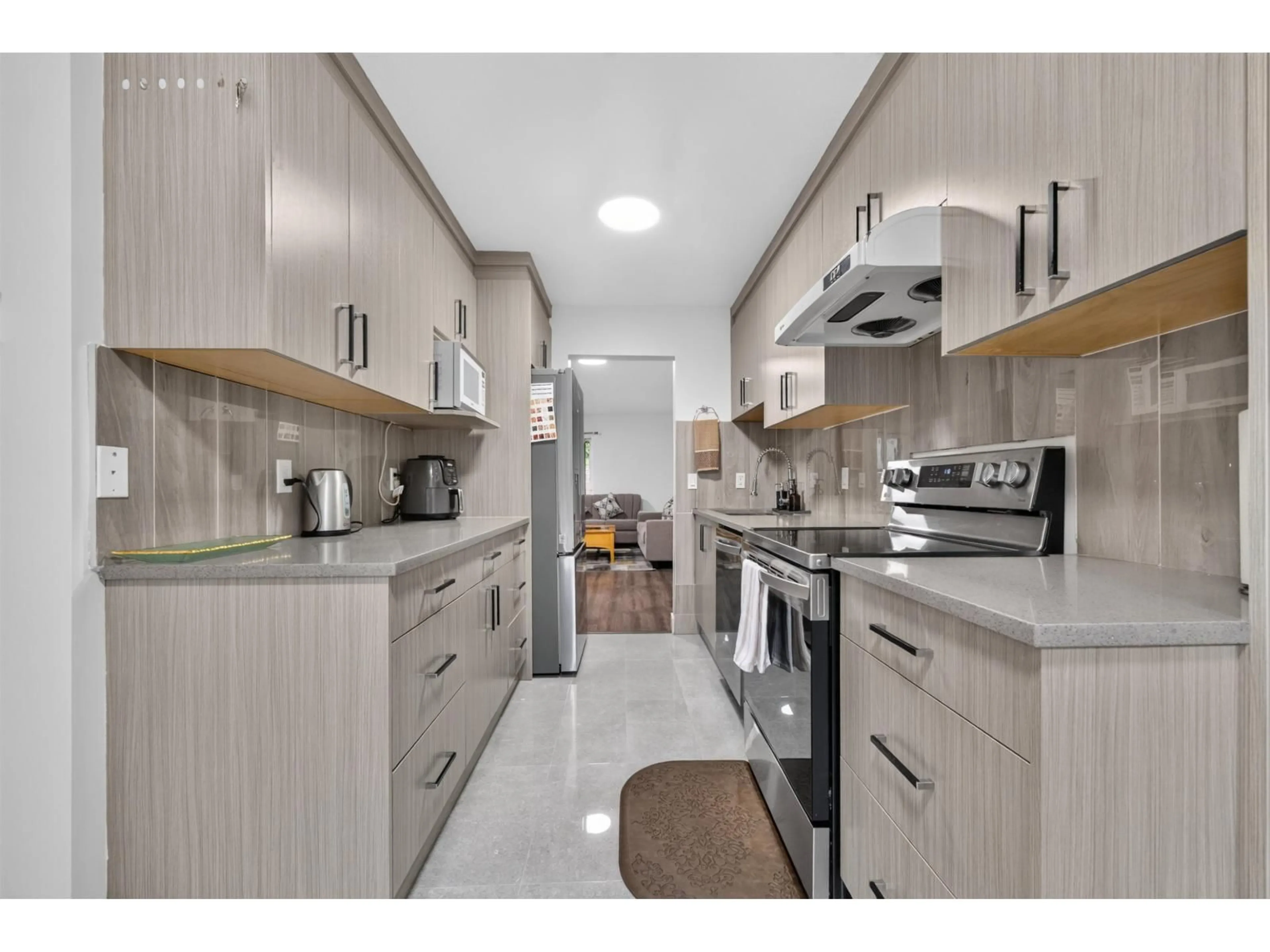 Standard kitchen, unknown for 121 - 9467 PRINCE CHARLES BOULEVARD, Surrey British Columbia V3V7G1