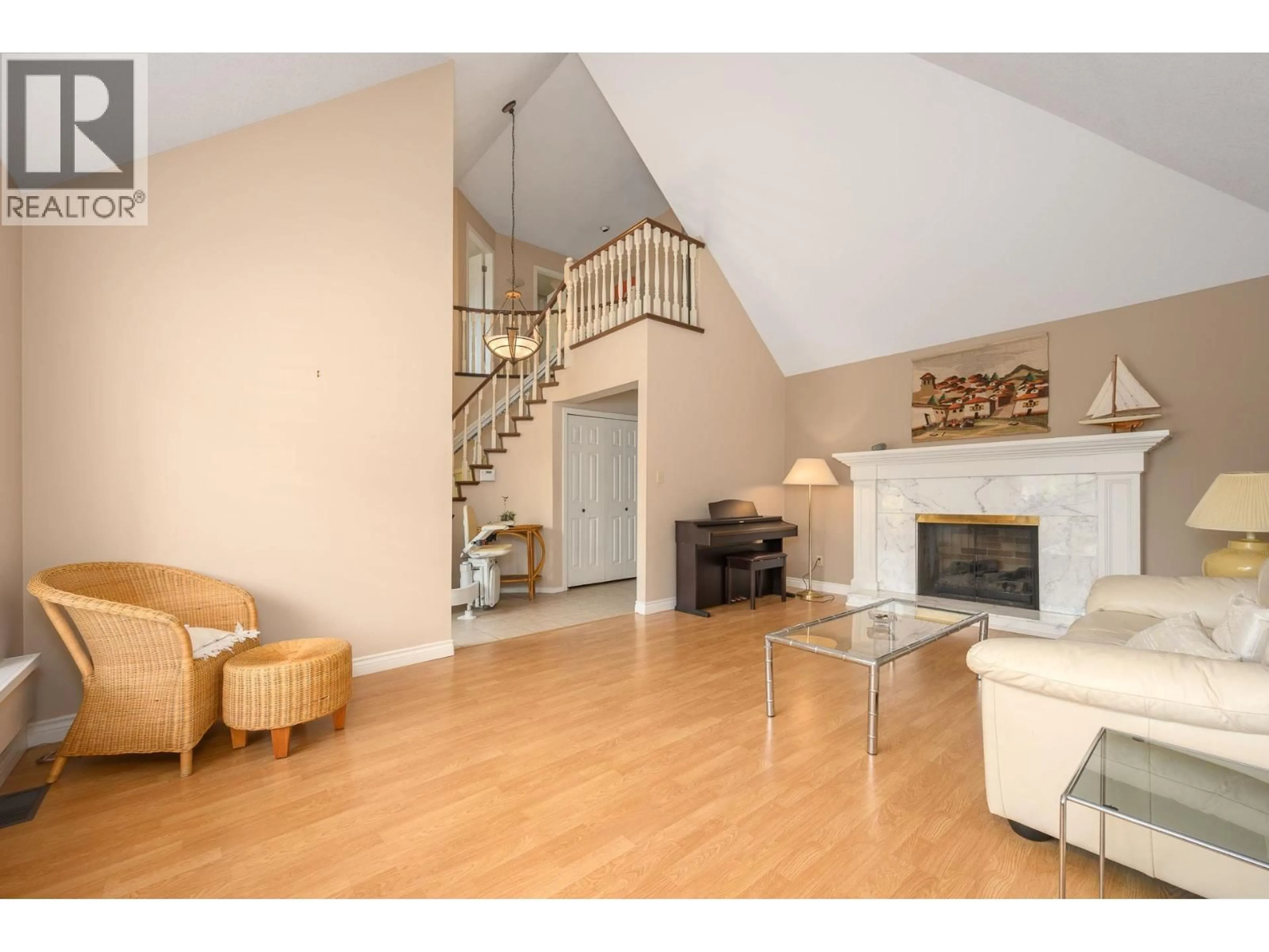 Living room with furniture, wood/laminate floor for 84 - 6600 LUCAS ROAD, Richmond British Columbia V7C4T1