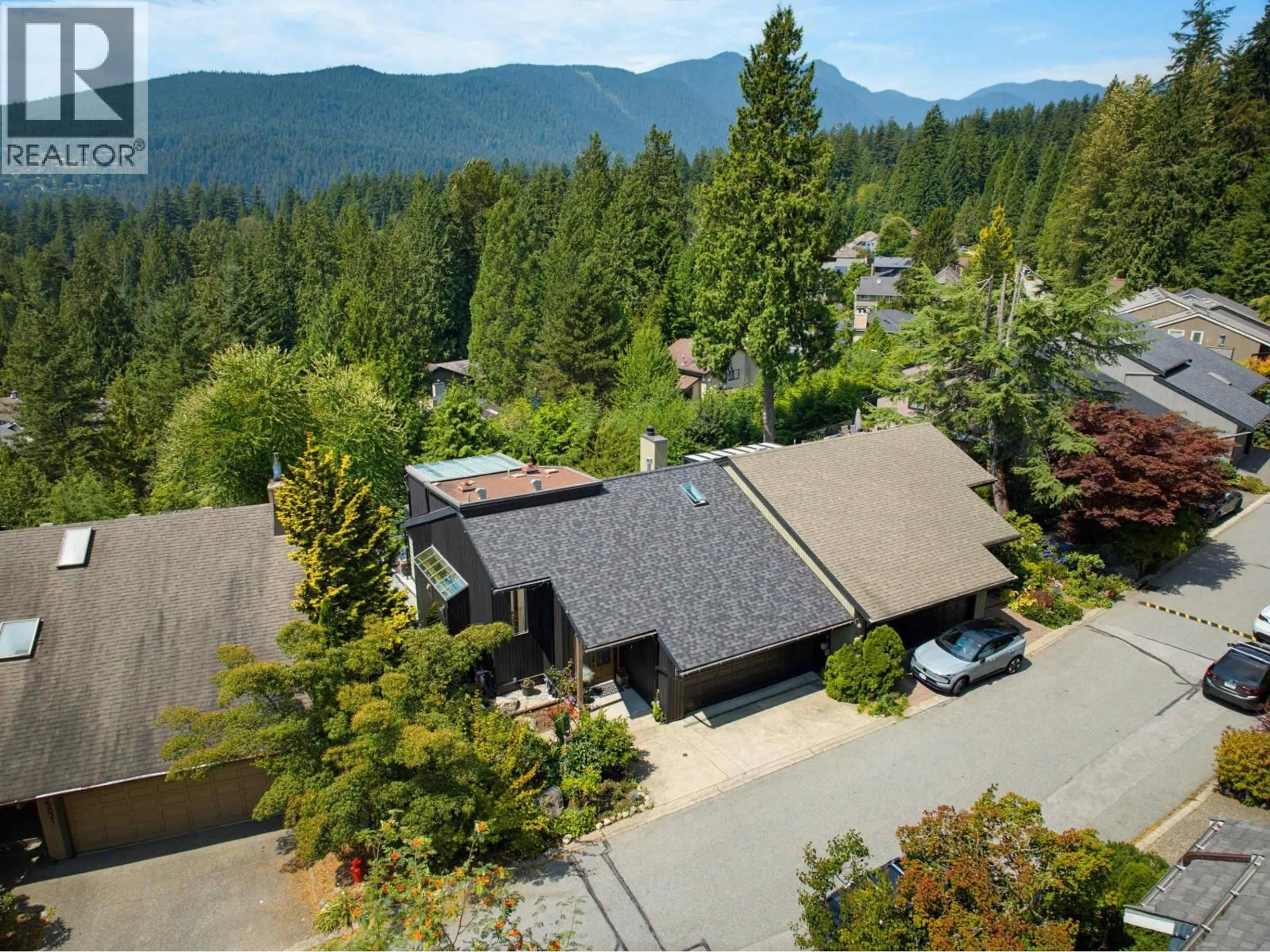 A pic from outside/outdoor area/front of a property/back of a property/a pic from drone, mountain view for 5623 EAGLE COURT, North Vancouver British Columbia V7R4V4