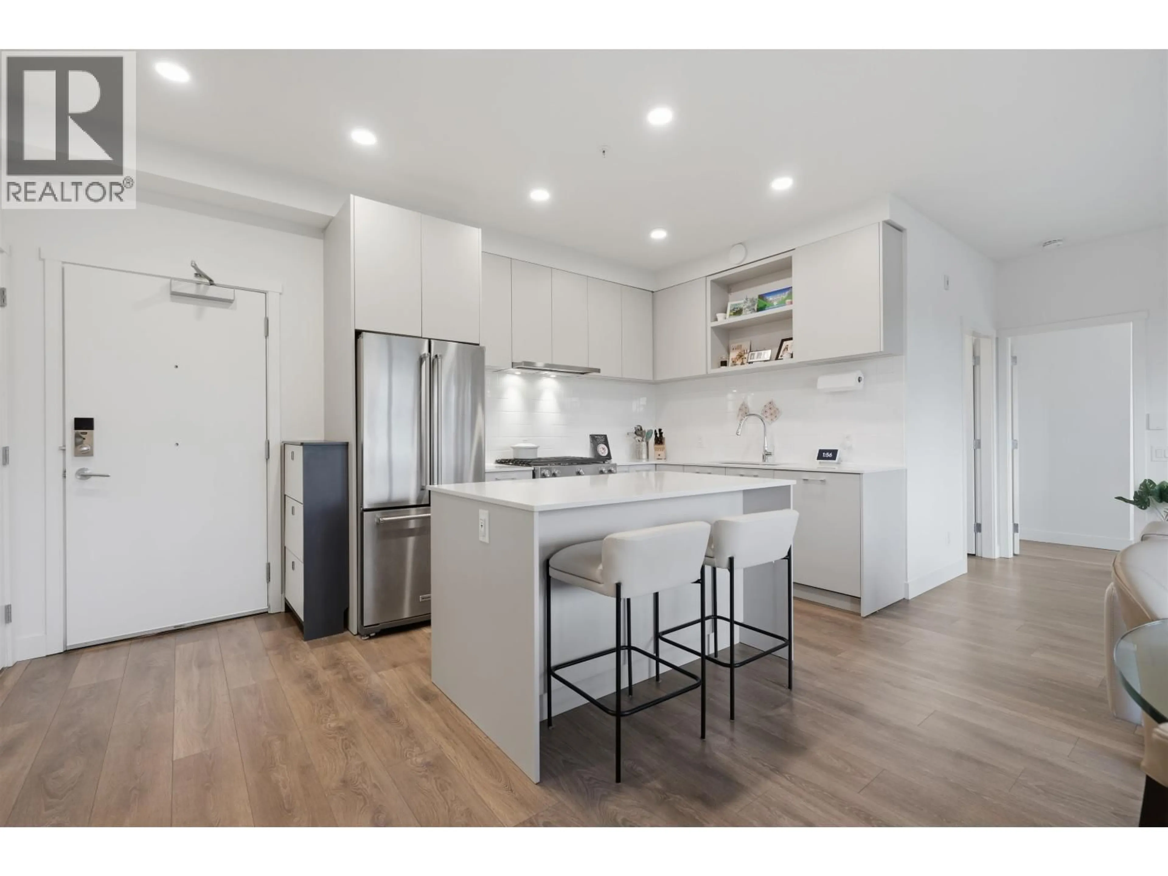 Open concept kitchen, wood/laminate floor for 611 - 741 ANSKAR COURT, Coquitlam British Columbia V3J0N3