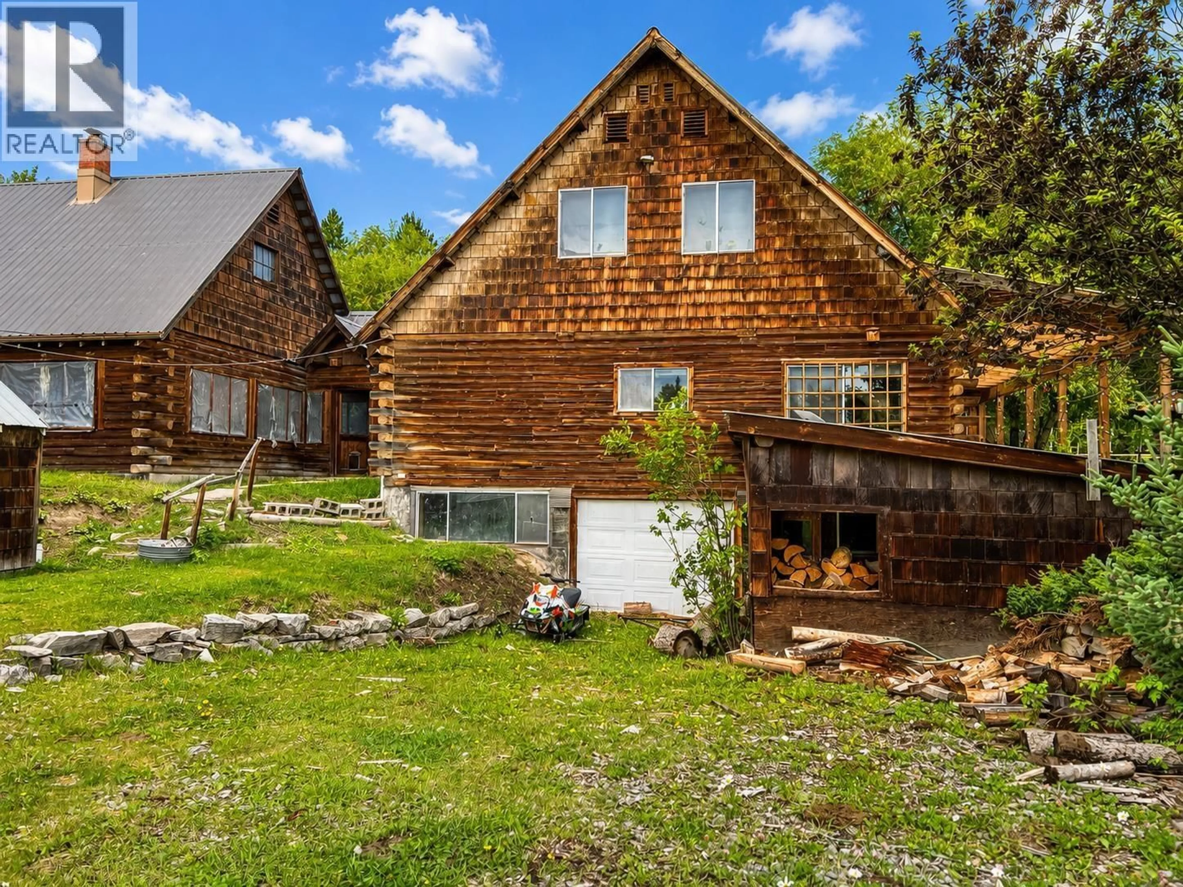 A pic from outside/outdoor area/front of a property/back of a property/a pic from drone, street for 16239 LILY LAKE ROAD, Fraser Lake British Columbia V0J1S0