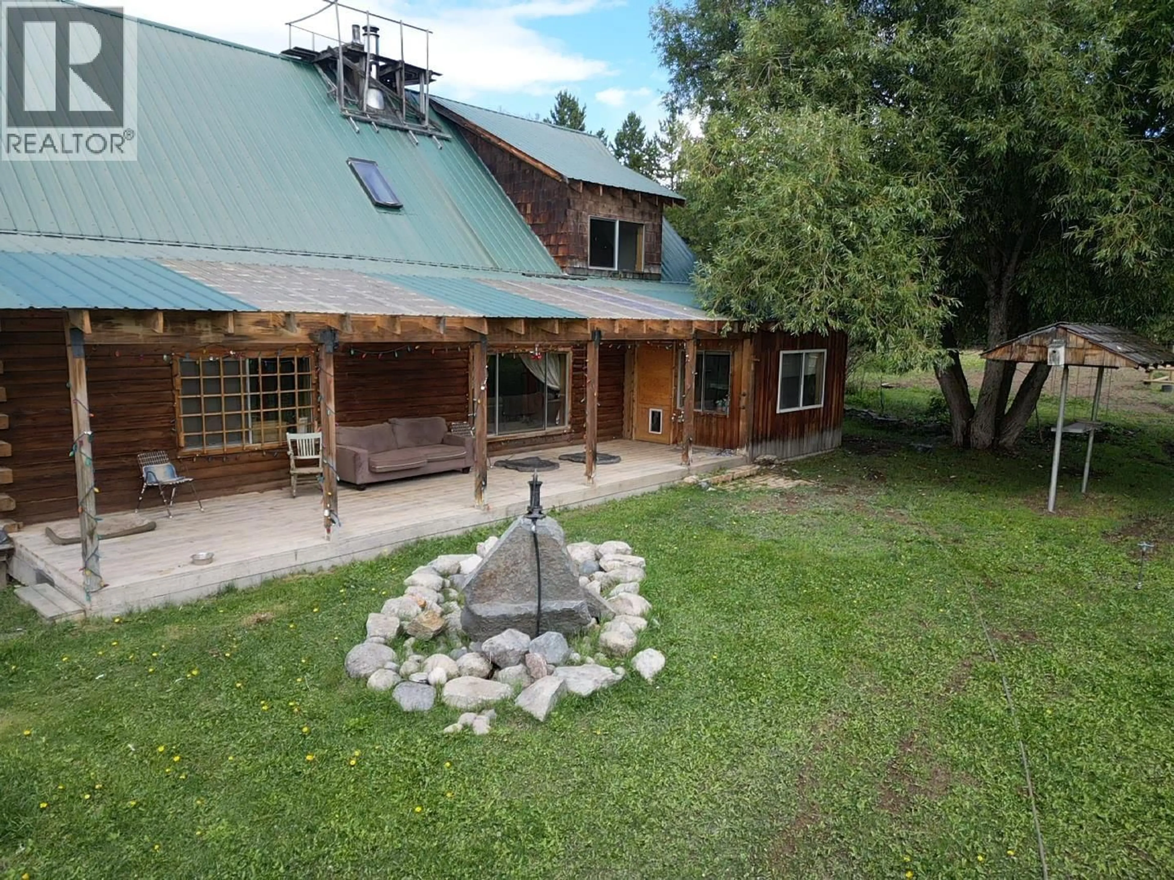 A pic from outside/outdoor area/front of a property/back of a property/a pic from drone, mountain view for 16239 LILY LAKE ROAD, Fraser Lake British Columbia V0J1S0