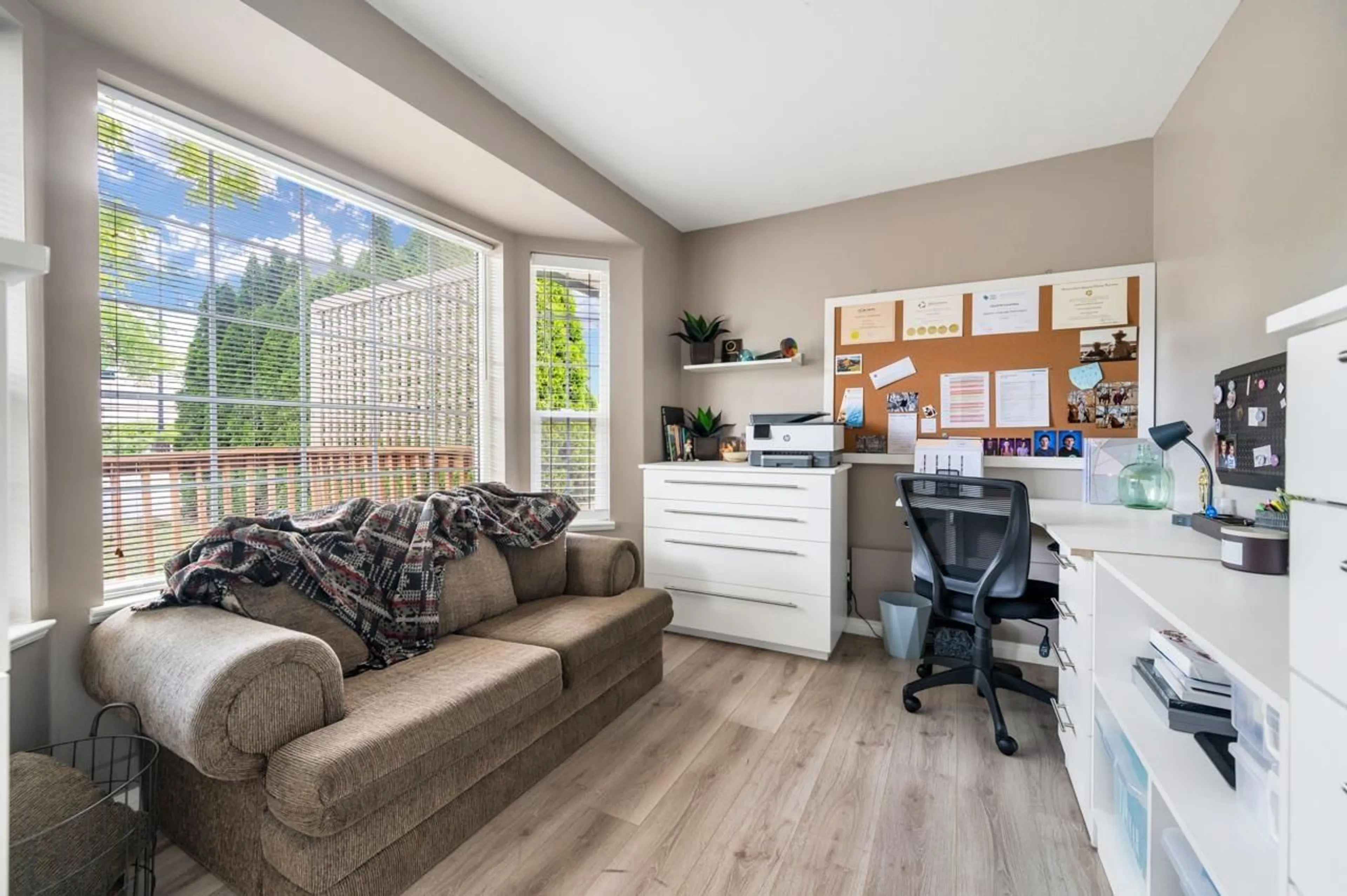 Living room with furniture, wood/laminate floor for 35026 EXBURY AVENUE, Abbotsford British Columbia V2S6X6