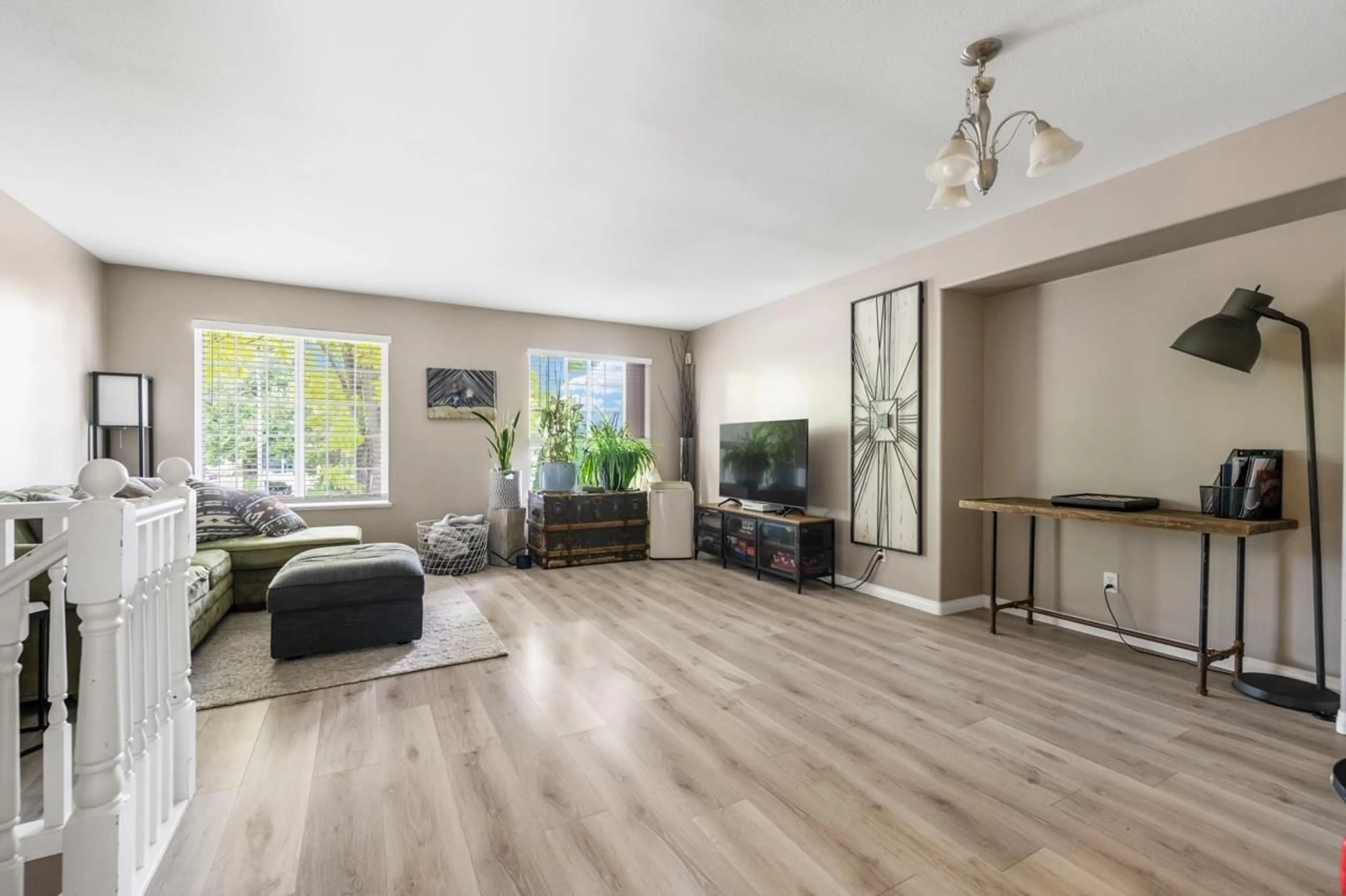 Living room with furniture, wood/laminate floor for 35026 EXBURY AVENUE, Abbotsford British Columbia V2S6X6