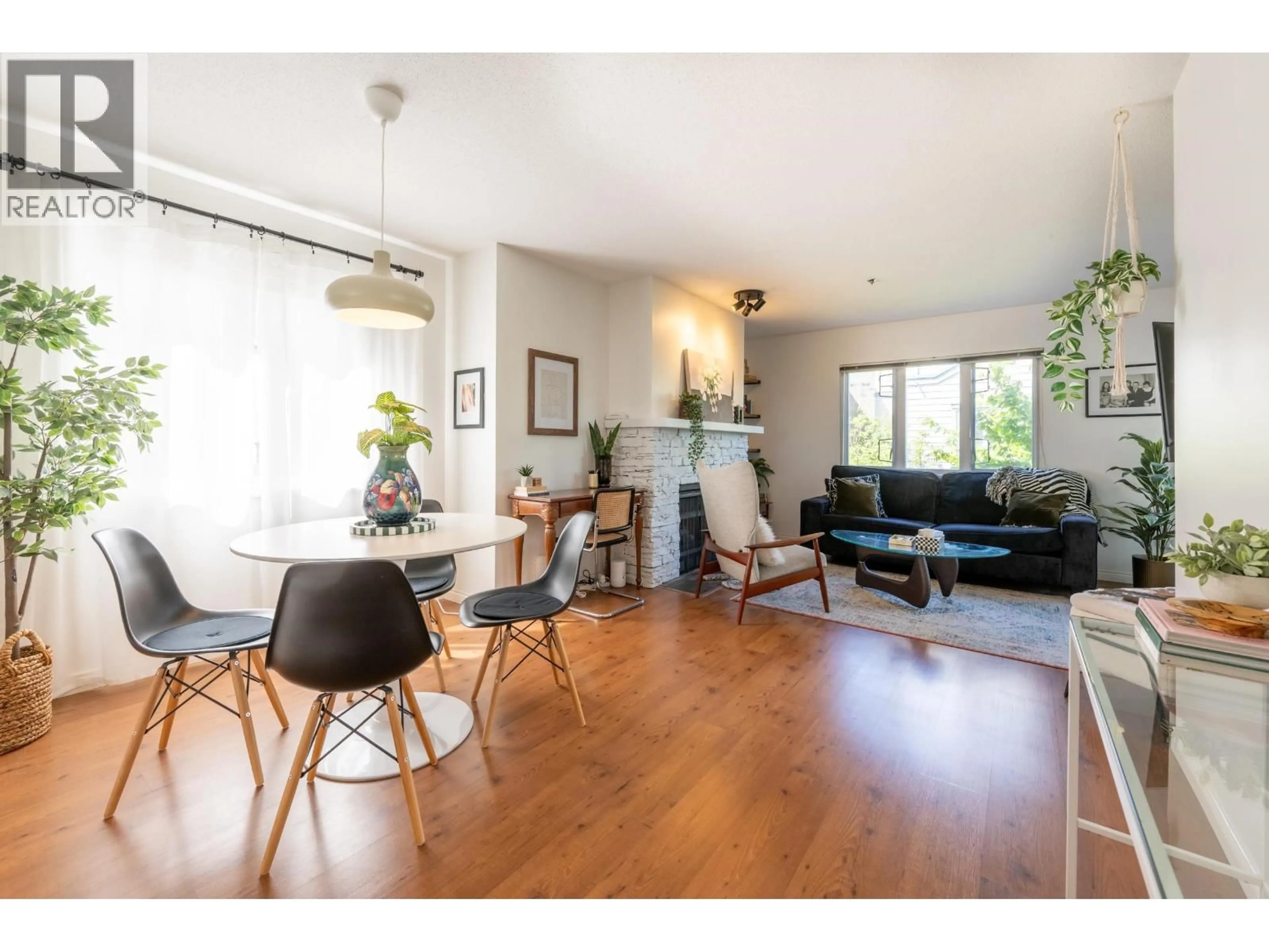 Living room with furniture, wood/laminate floor for 209 - 643 7TH AVENUE, Vancouver British Columbia V5Z1B6