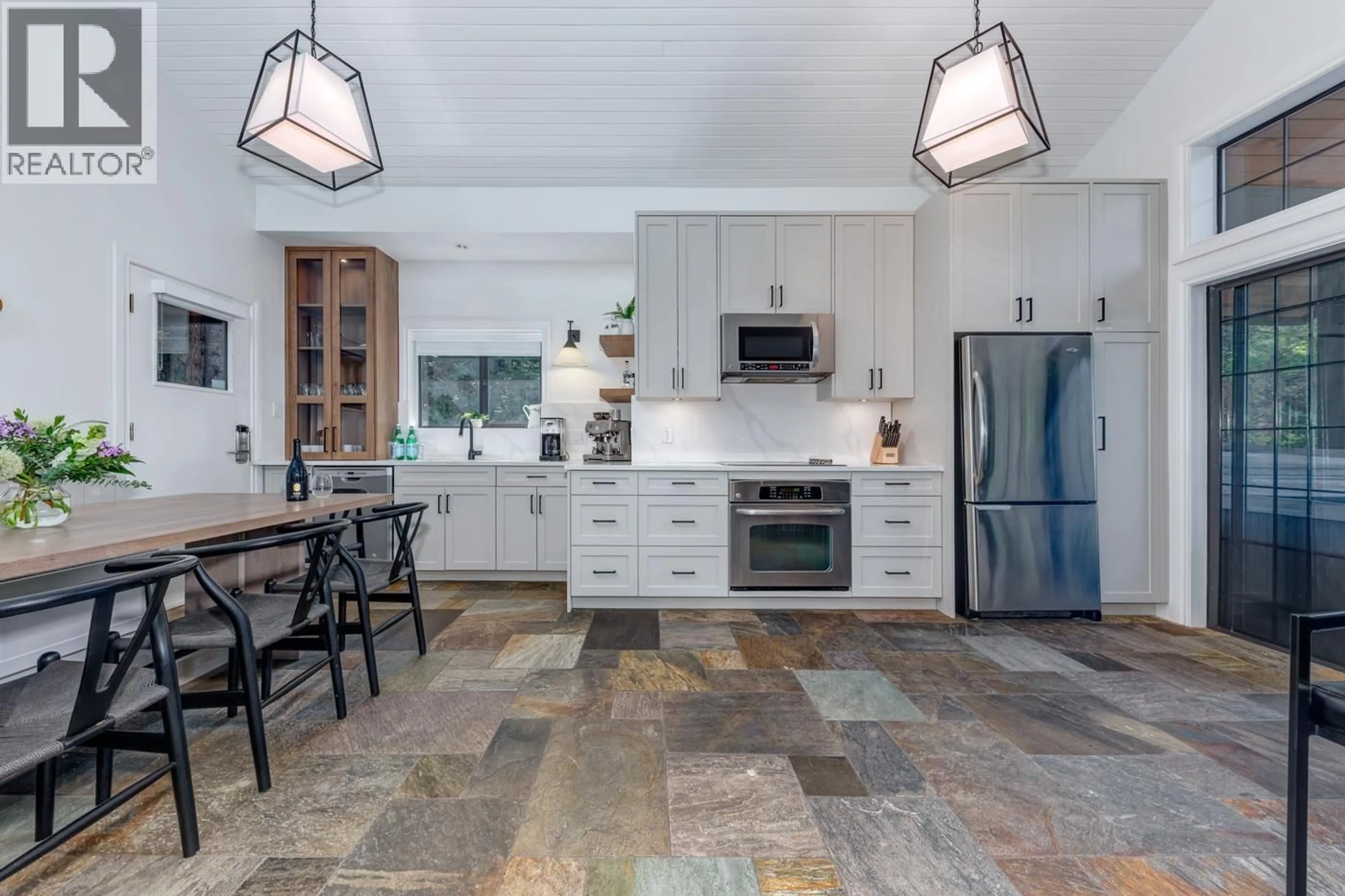 Open concept kitchen, ceramic/tile floor for 2212 GONDOLA WAY, Whistler British Columbia V8E0B4