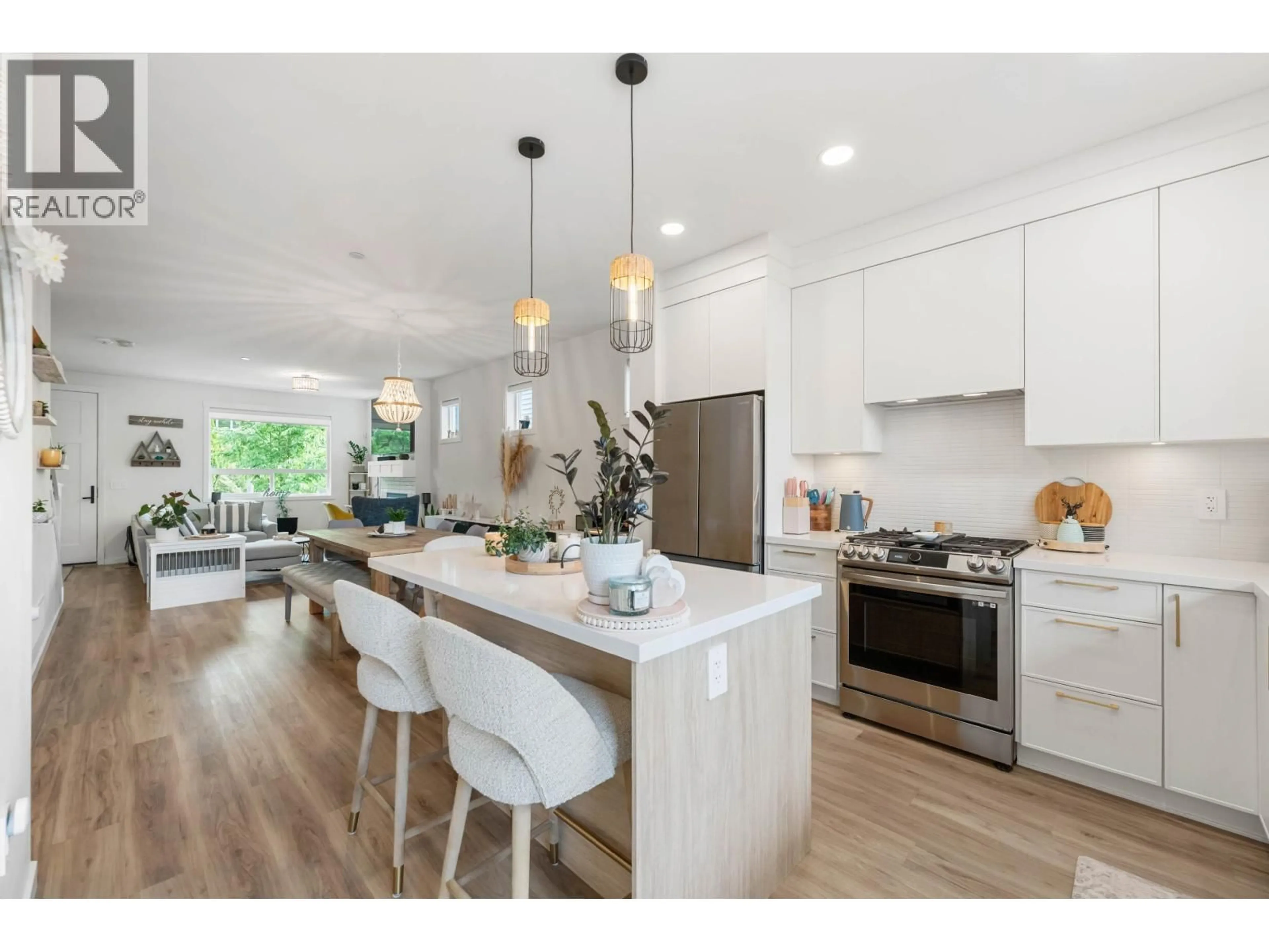 Open concept kitchen, wood/laminate floor for 25097 112 AVENUE, Maple Ridge British Columbia V2W0K6