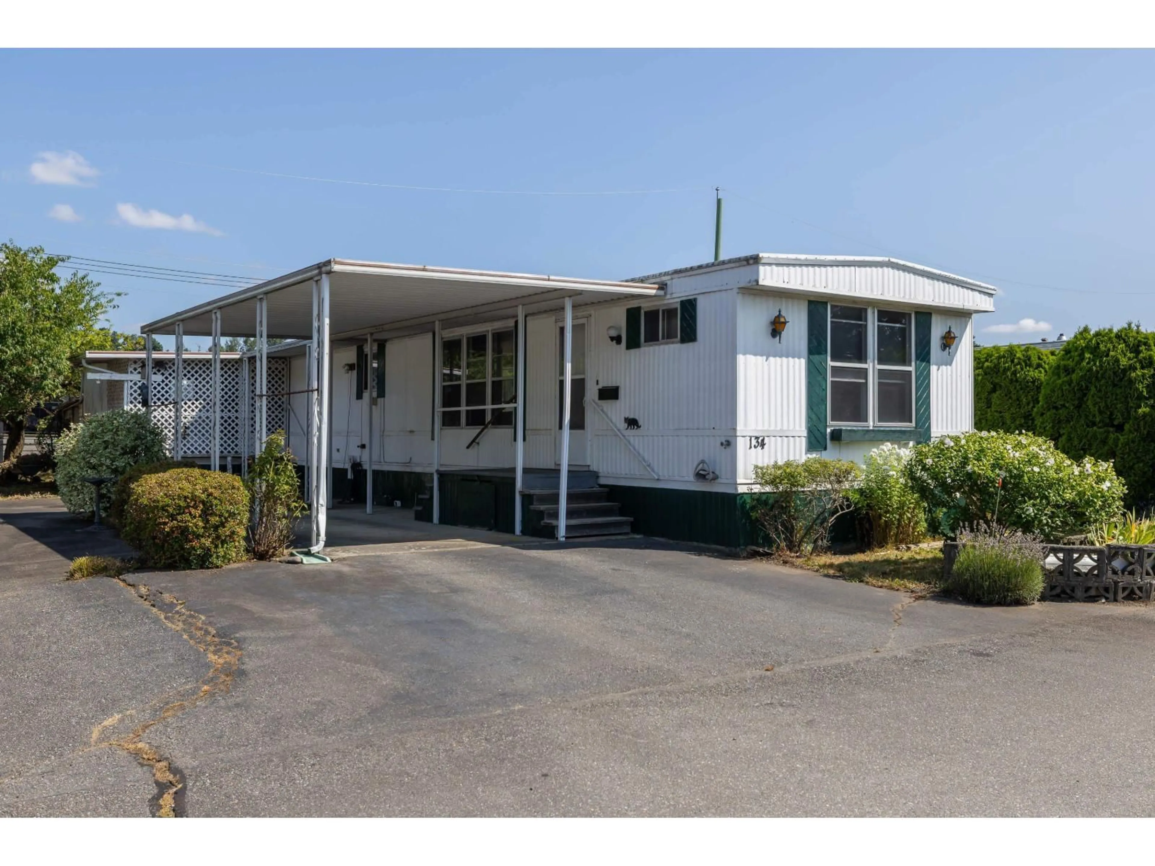 Home with vinyl exterior material, street for 134 - 27111 0 AVENUE, Langley British Columbia V4W2T3