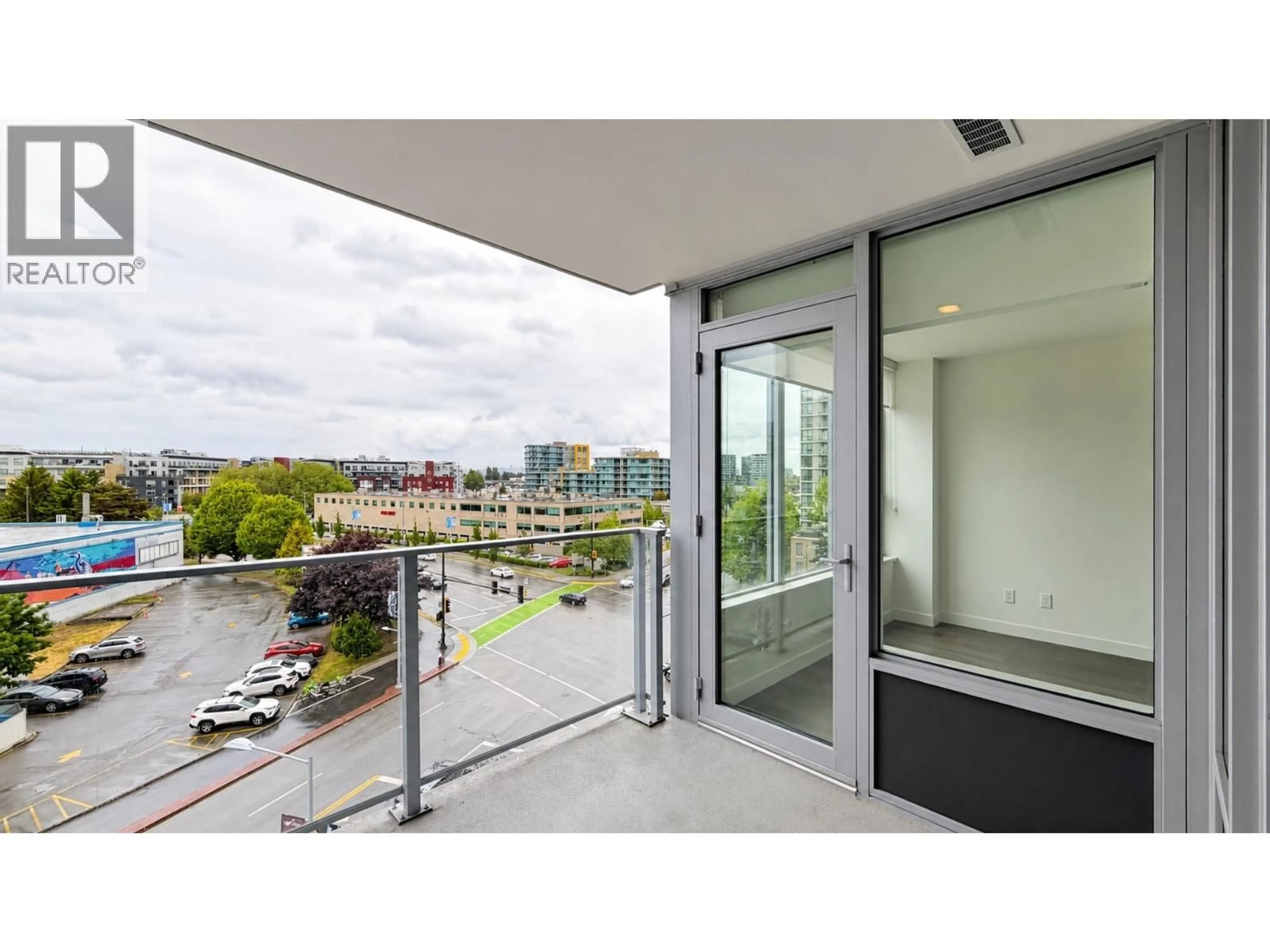 Balcony in the apartment, city buildings view from balcony for 709 - 7488 LANSDOWNE ROAD, Richmond British Columbia V7C0B9