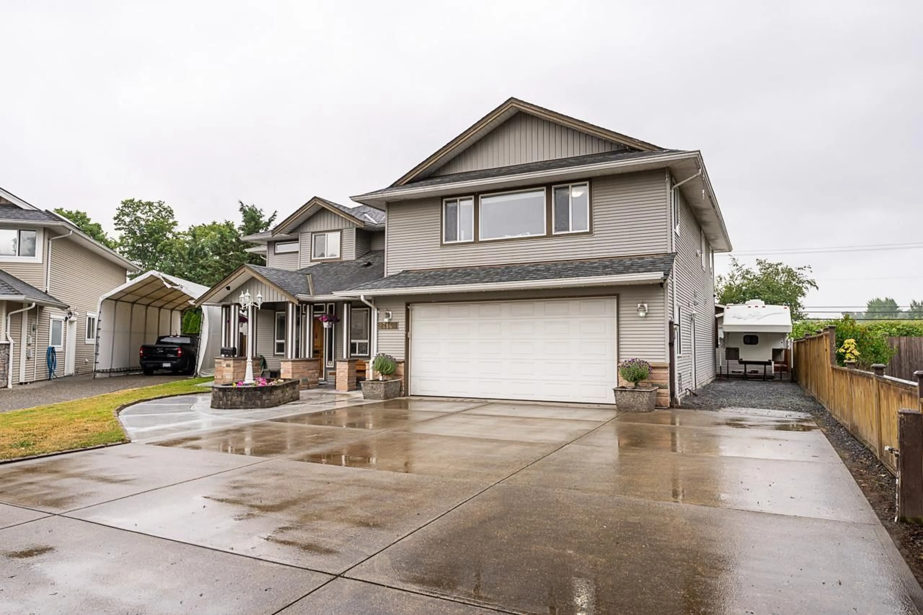 Home with vinyl exterior material, street for 27144 25A AVENUE, Langley British Columbia V4W3N4