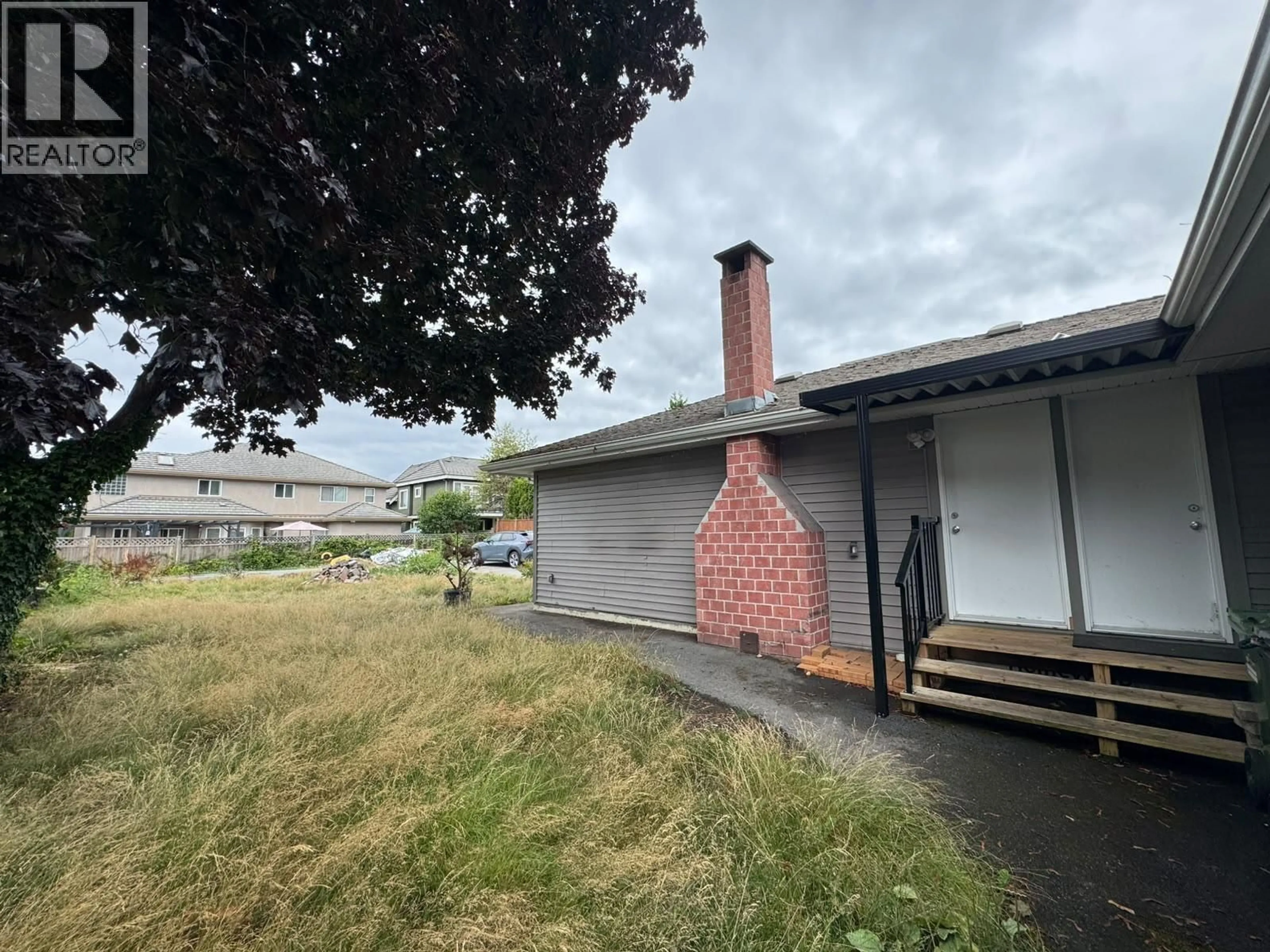 A pic from outside/outdoor area/front of a property/back of a property/a pic from drone, street for 8591 WILLIAMS ROAD, Richmond British Columbia V7G1G4