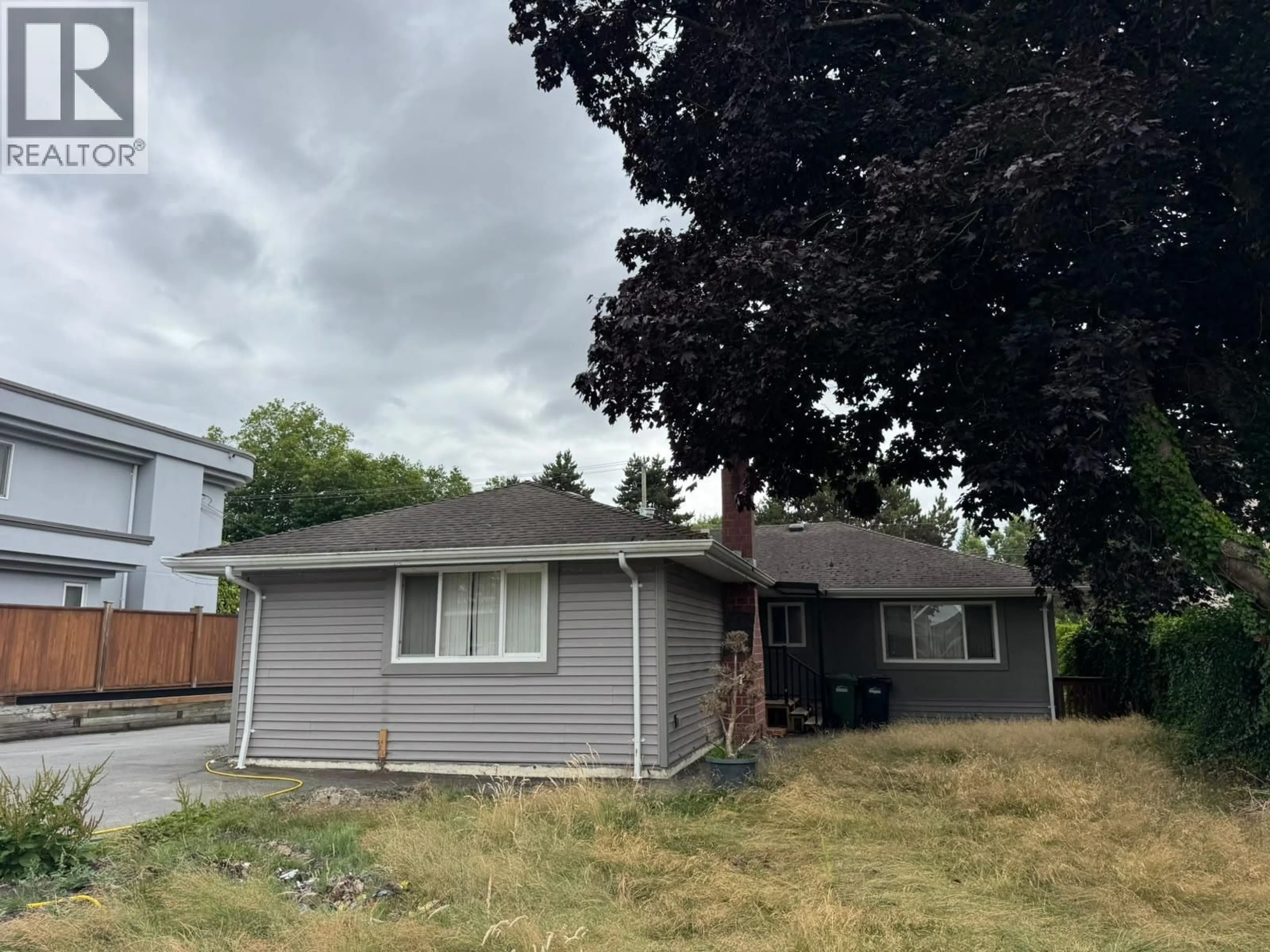 Home with vinyl exterior material, street for 8591 WILLIAMS ROAD, Richmond British Columbia V7G1G4