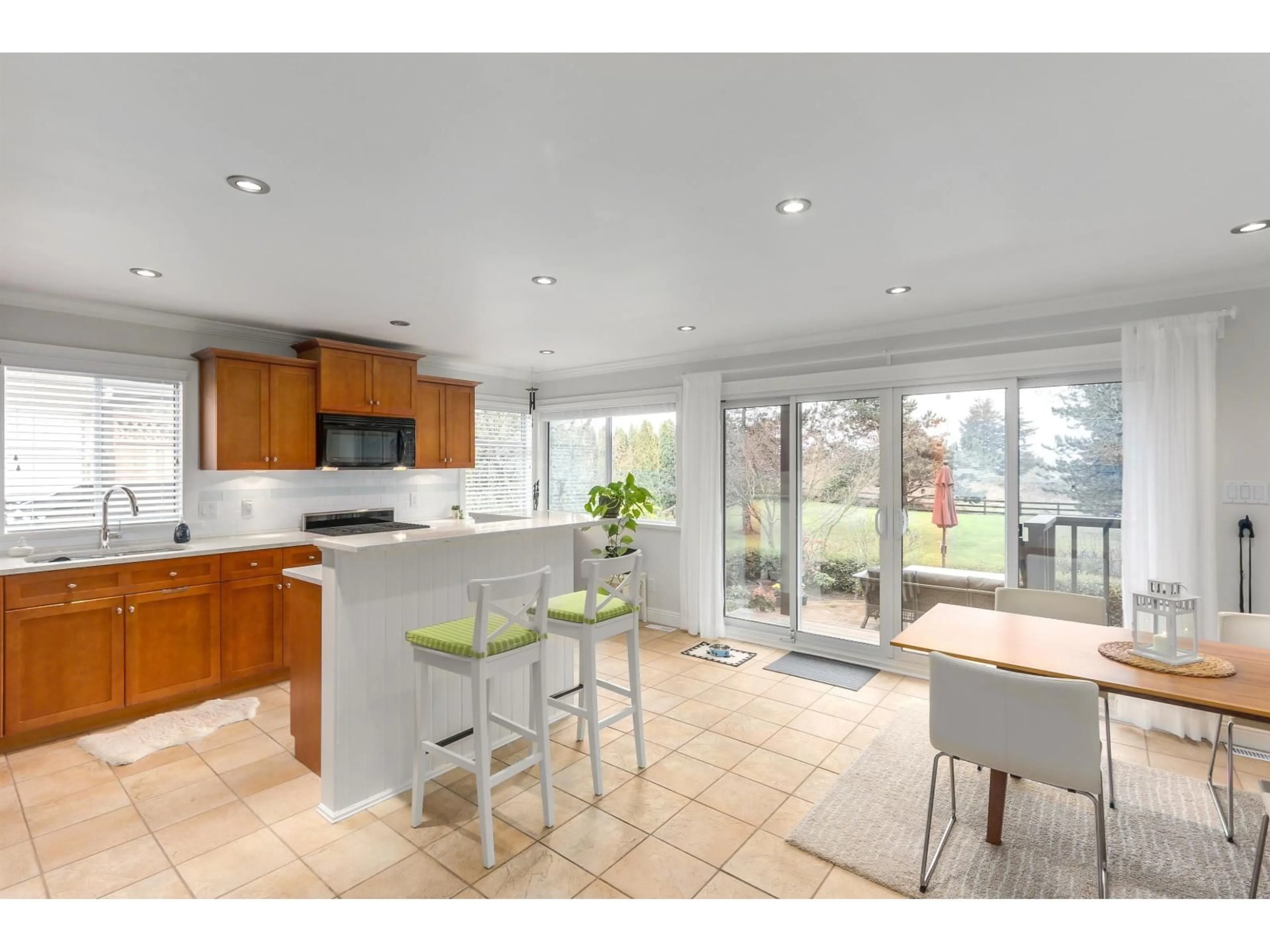 Open concept kitchen, ceramic/tile floor for 18118 CLAYTONWOOD CRESCENT, Surrey British Columbia V3S7T5
