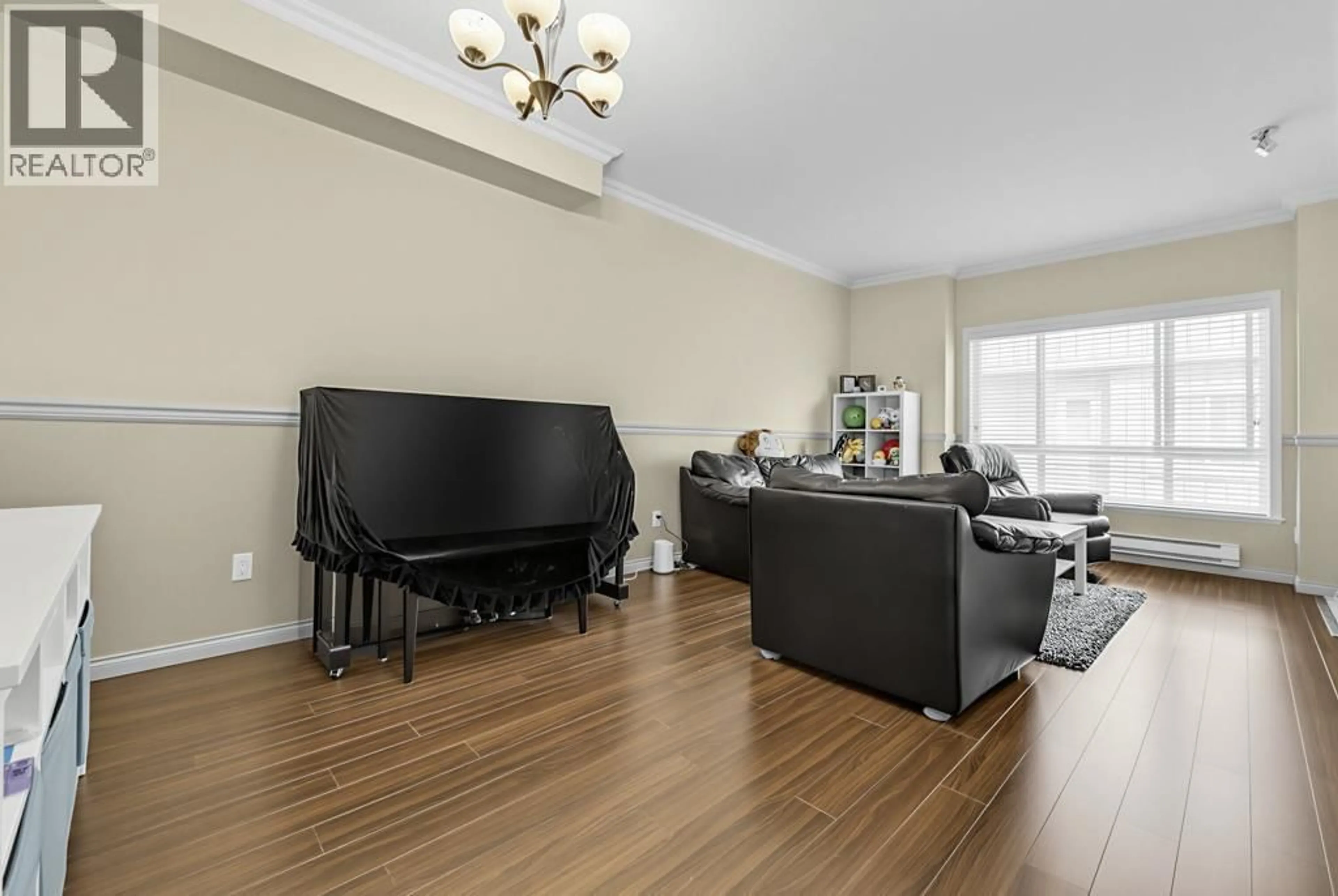 Living room with furniture, wood/laminate floor for 27 - 9451 GRANVILLE AVENUE, Richmond British Columbia V6Y1P9