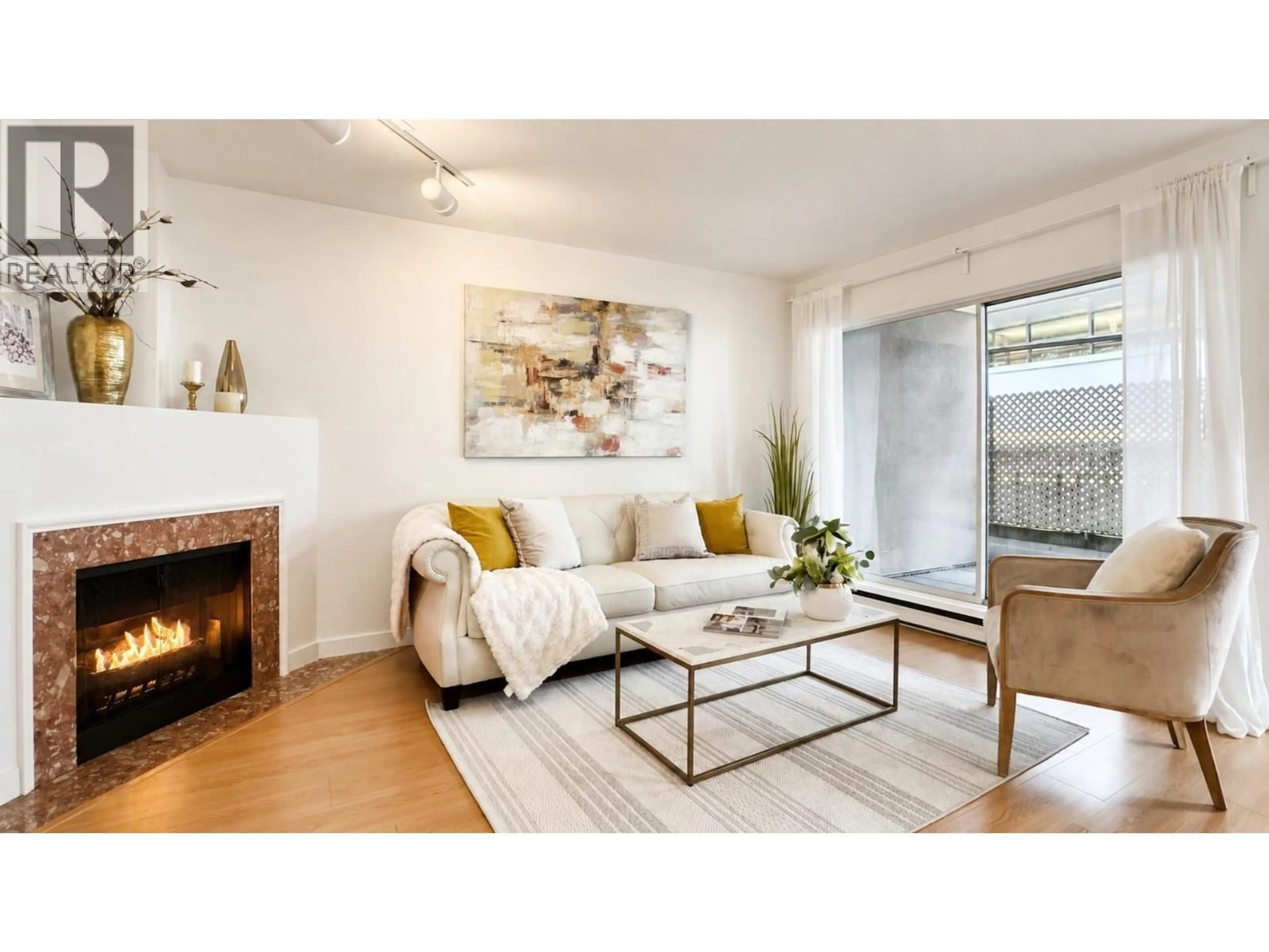 Living room with furniture, wood/laminate floor for 103 - 985 10TH AVENUE, Vancouver British Columbia V5Z1L9