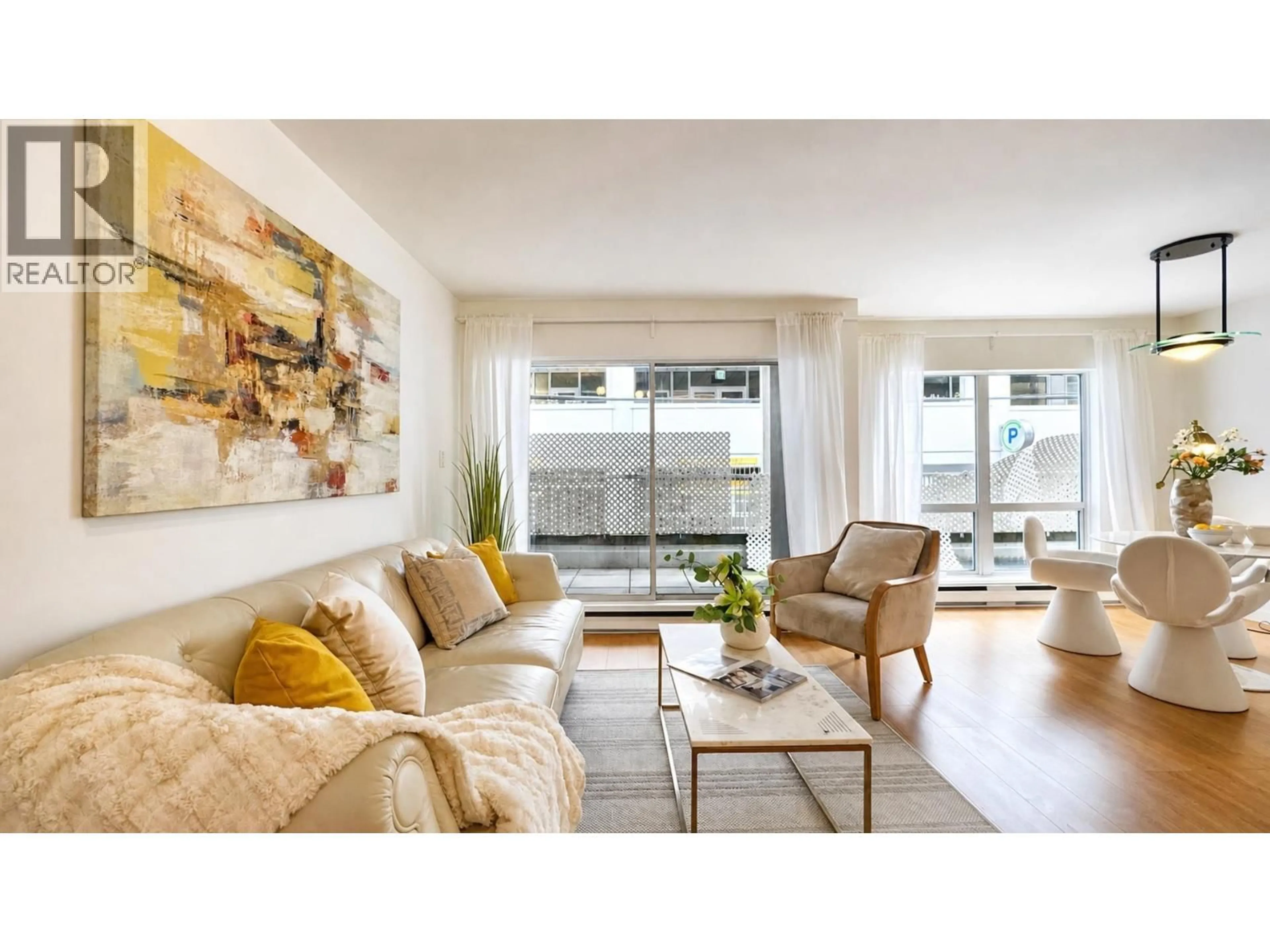 Living room with furniture, wood/laminate floor for 103 - 985 10TH AVENUE, Vancouver British Columbia V5Z1L9
