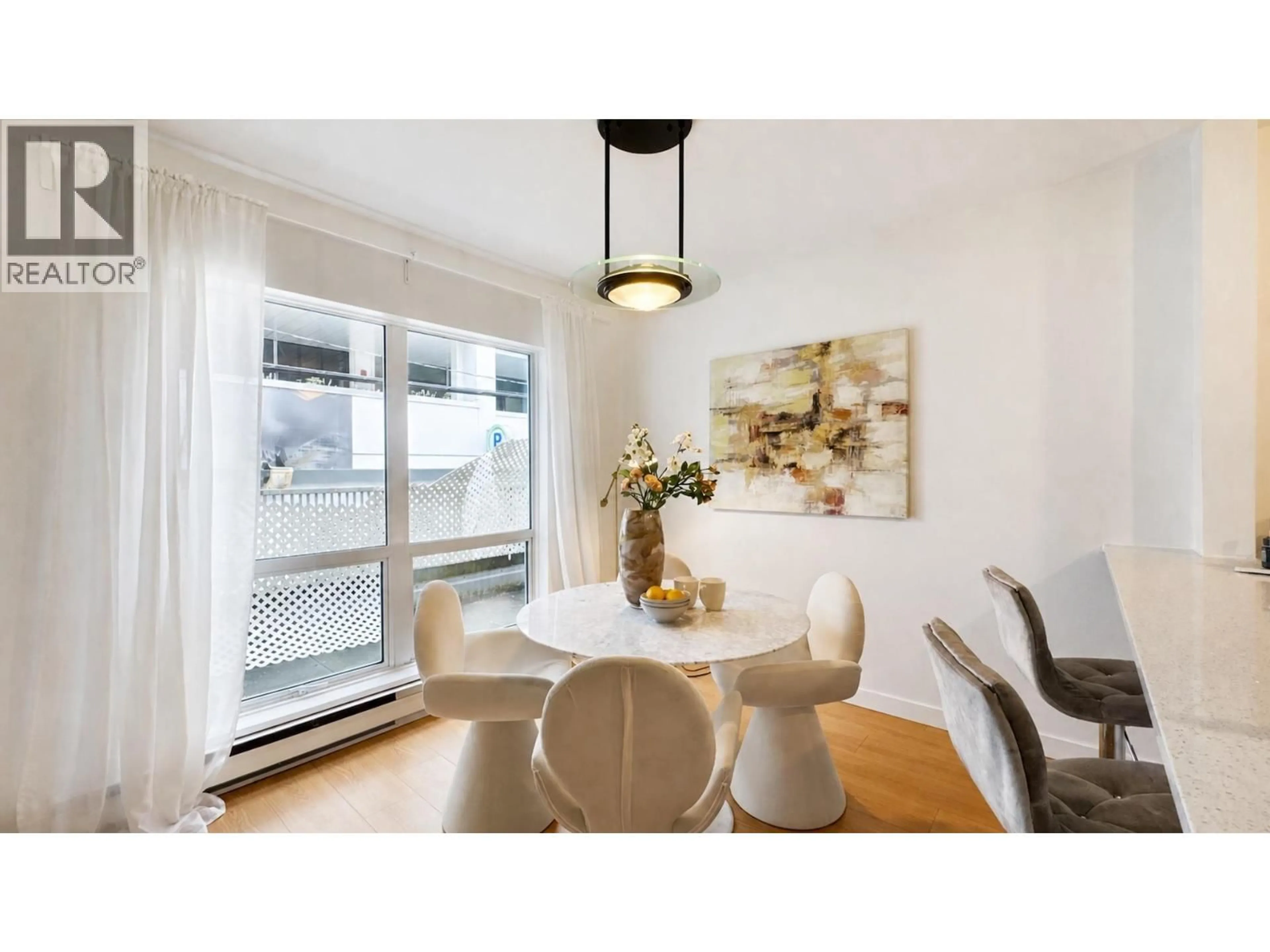 Dining room, wood/laminate floor for 103 - 985 10TH AVENUE, Vancouver British Columbia V5Z1L9