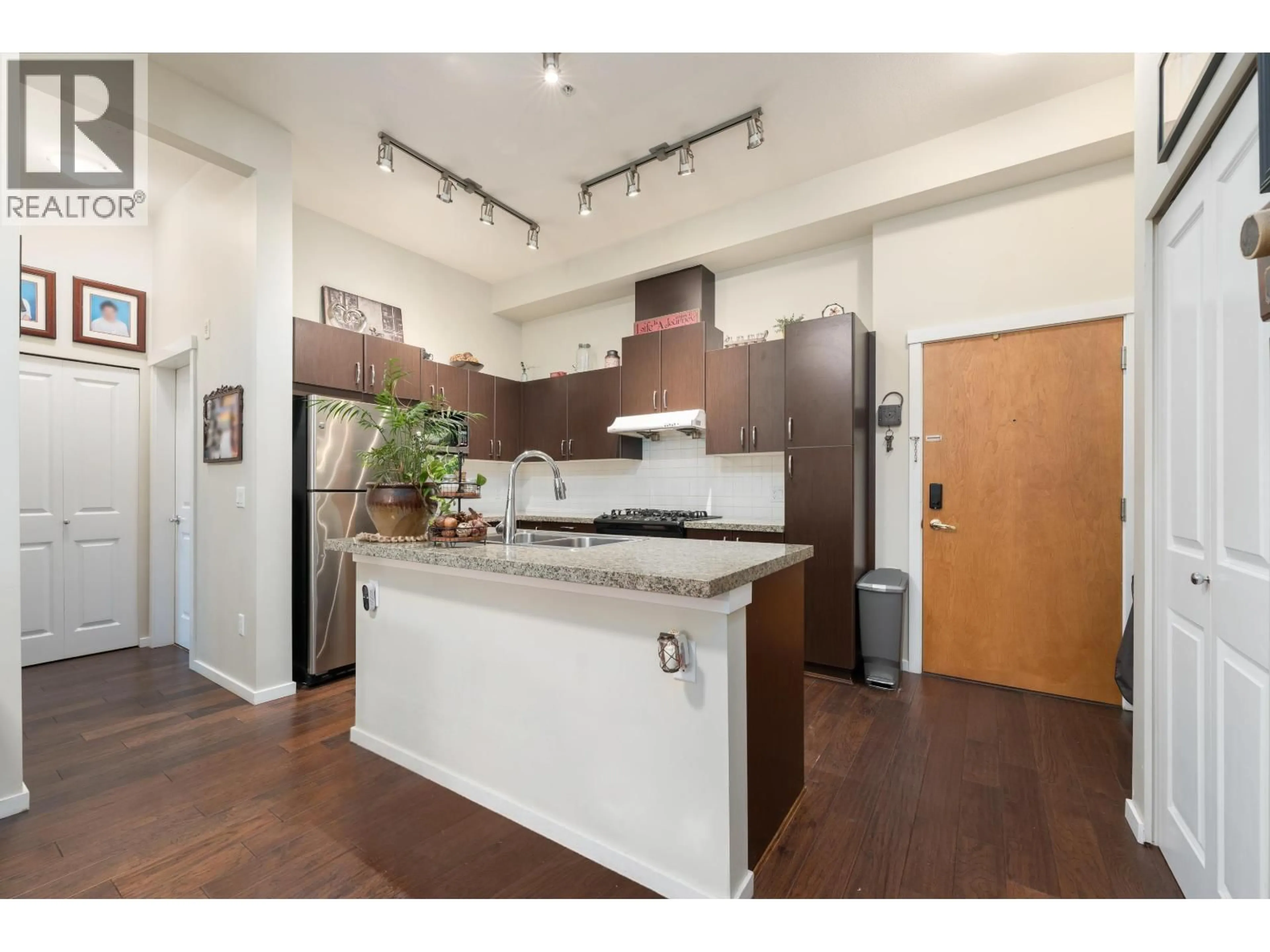 Open concept kitchen, wood/laminate floor for 104 - 1330 GENEST WAY, Coquitlam British Columbia V3E0A4