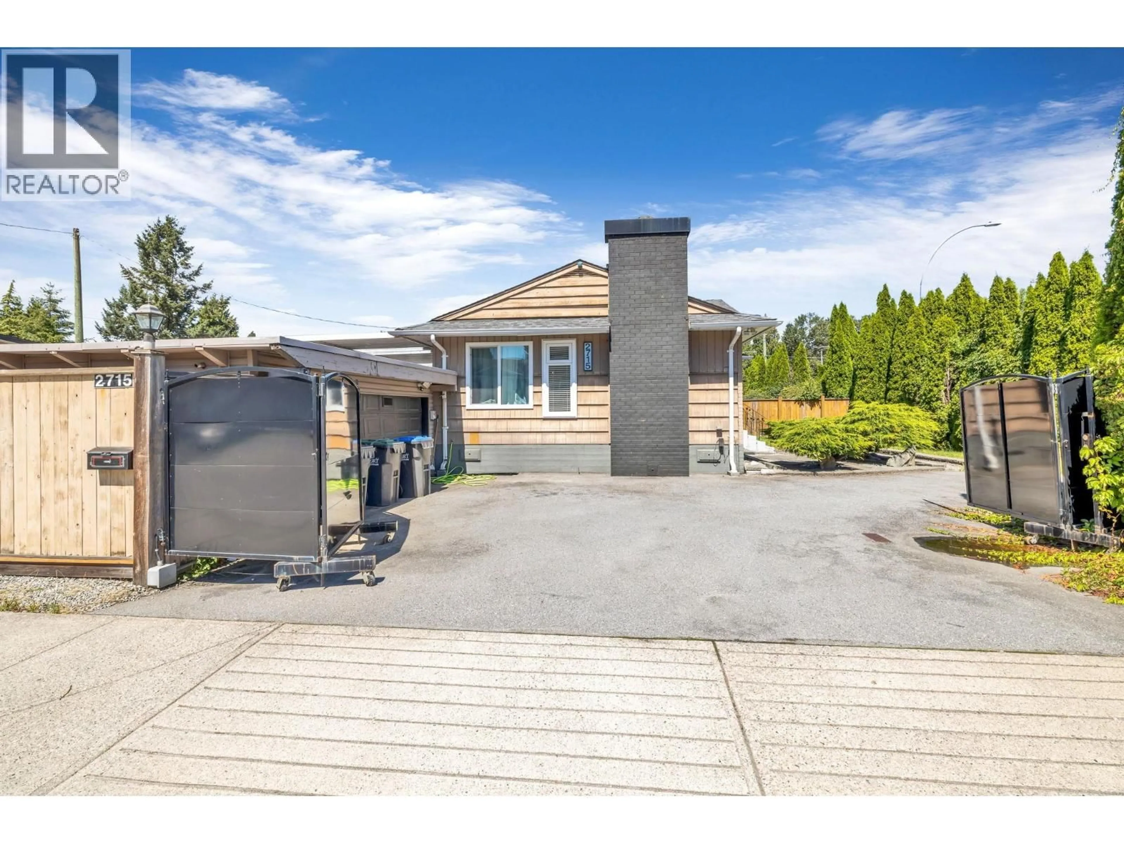 A pic from outside/outdoor area/front of a property/back of a property/a pic from drone, street for 2715 COAST MERIDIAN ROAD, Port Coquitlam British Columbia V3B3M6
