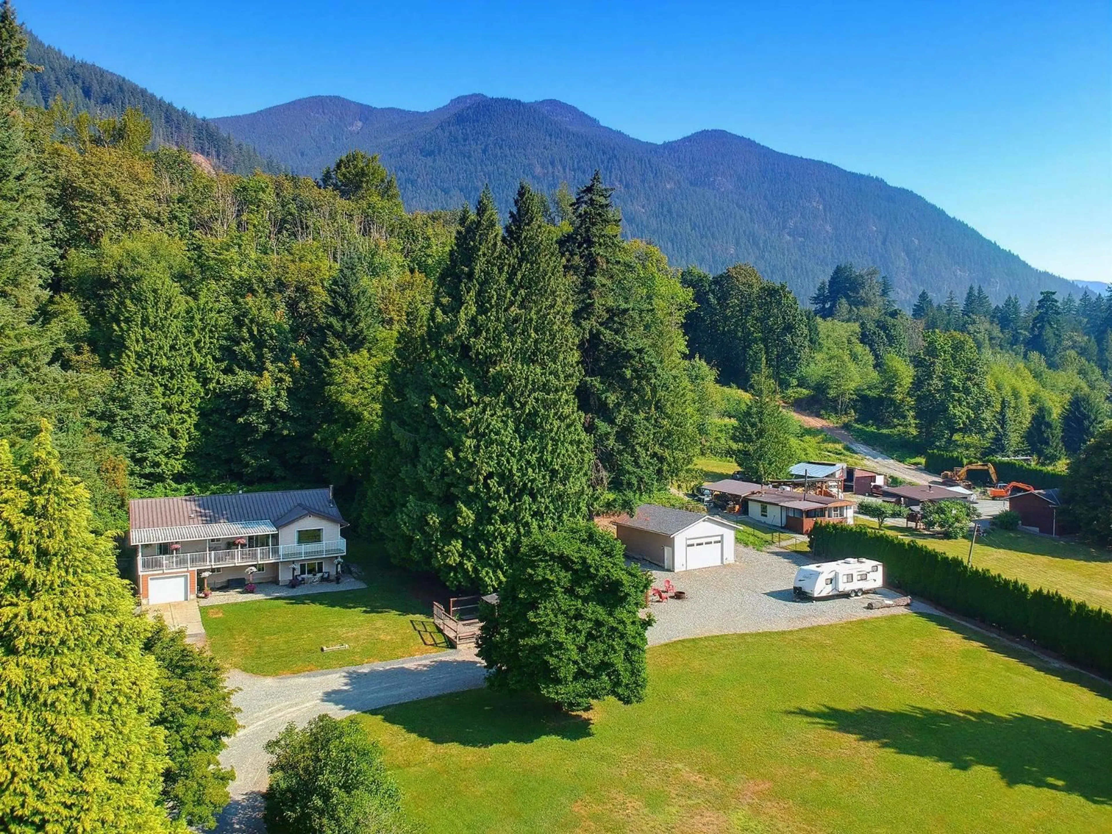 A pic from outside/outdoor area/front of a property/back of a property/a pic from drone, mountain view for 42045 HUSBAND ROAD, Mission British Columbia V0M1G0