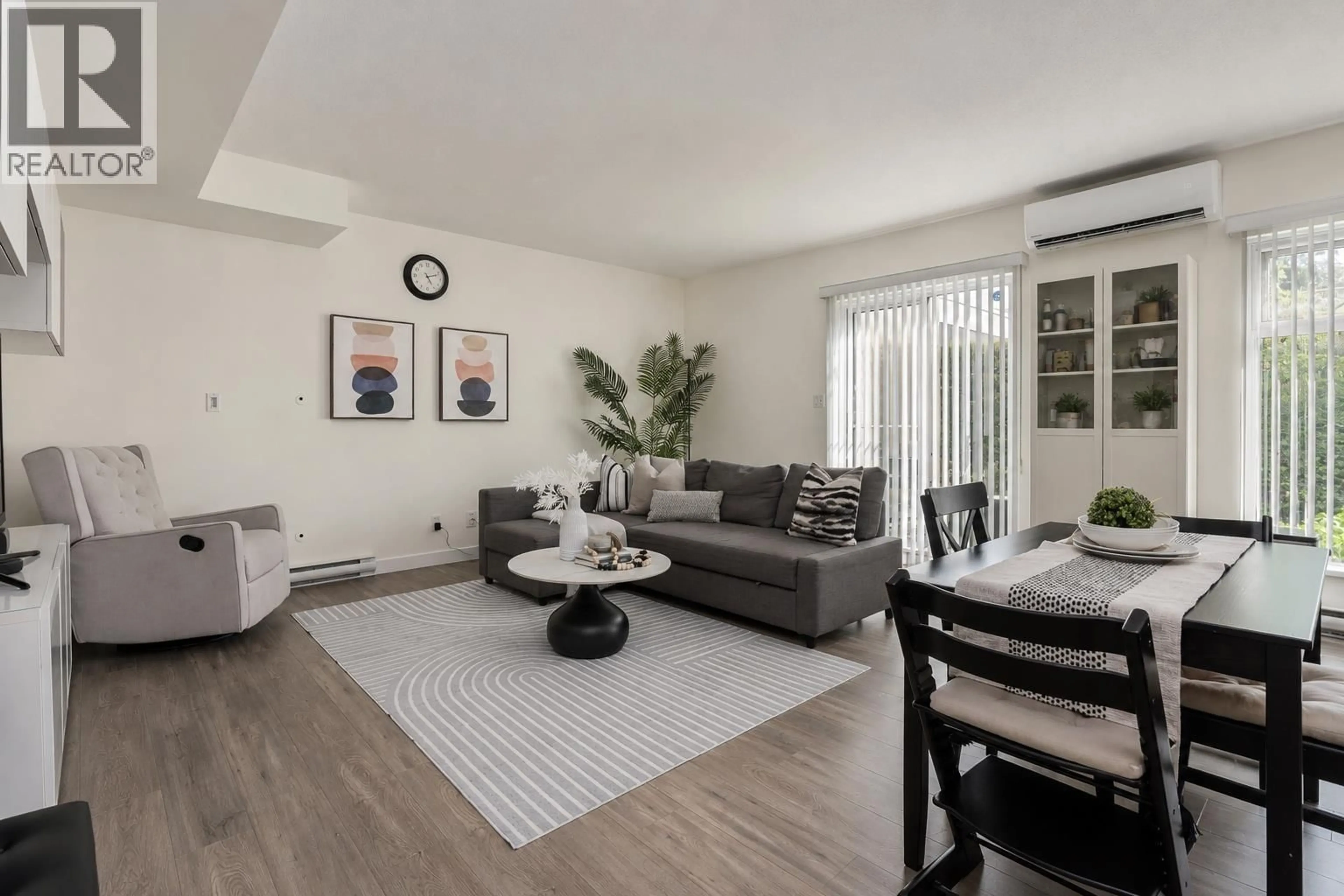 Living room with furniture, unknown for 103 - 2232 DOUGLAS ROAD, Burnaby British Columbia V5C0G9