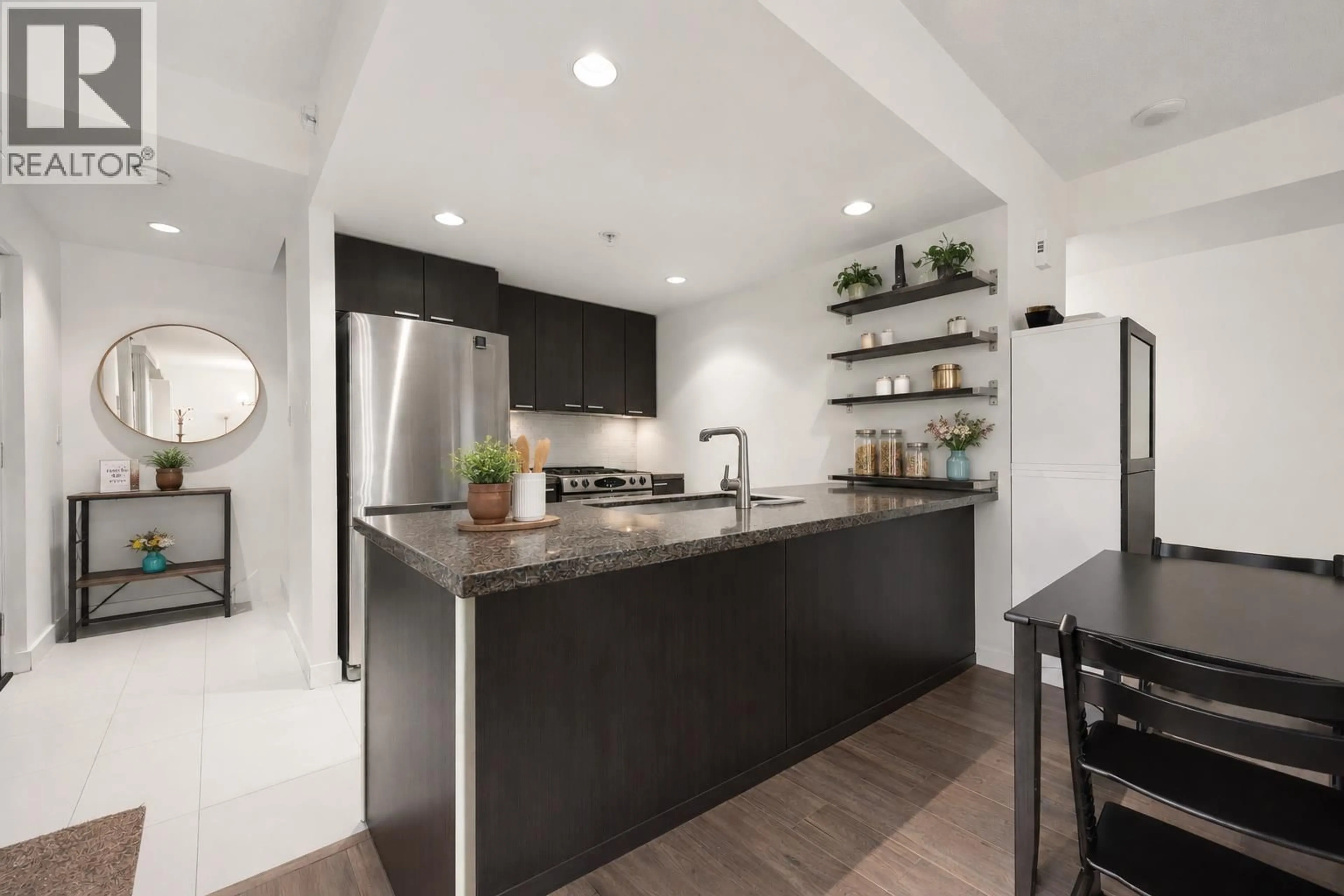 Contemporary kitchen, ceramic/tile floor for 103 - 2232 DOUGLAS ROAD, Burnaby British Columbia V5C0G9