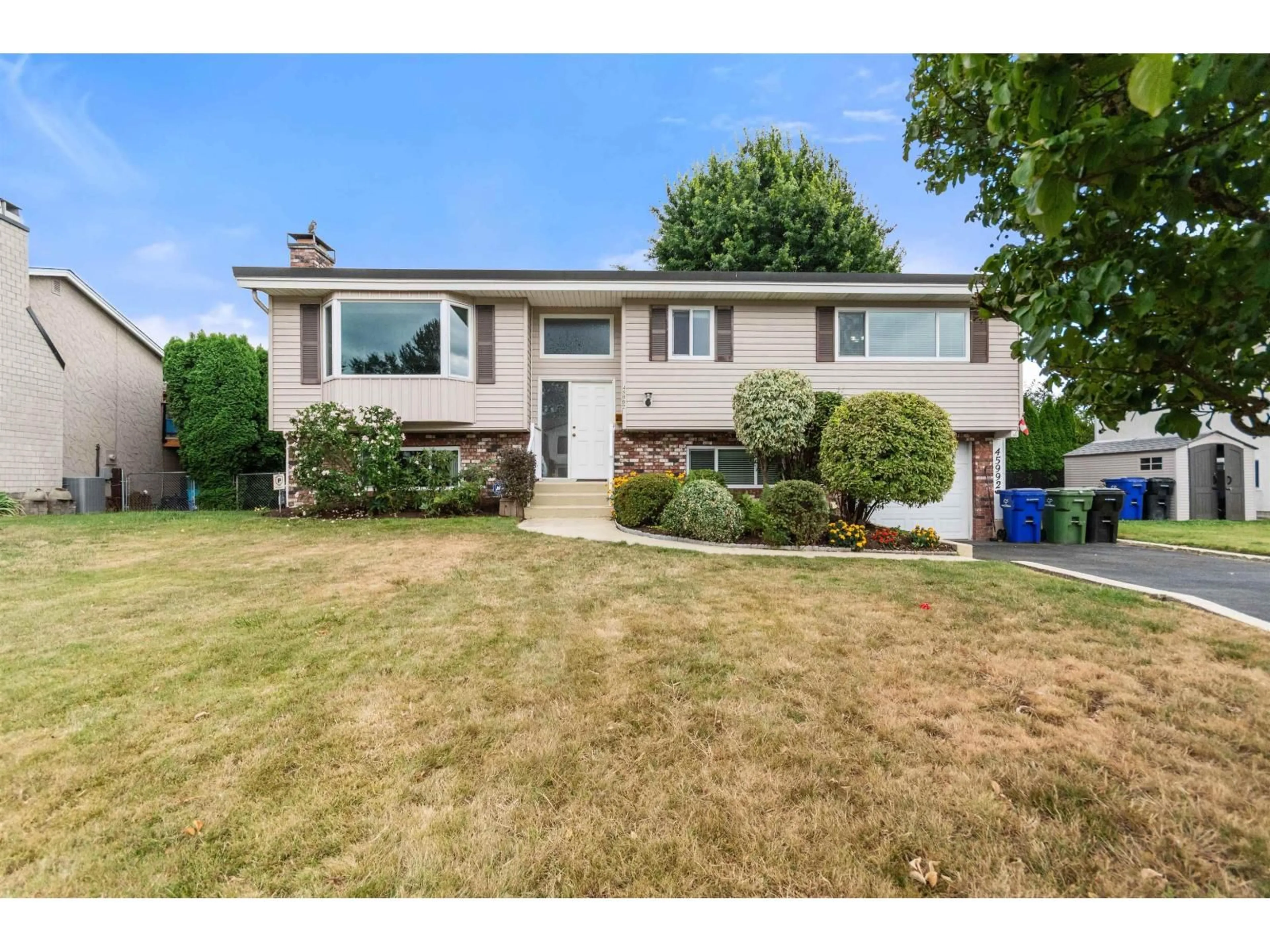Home with vinyl exterior material, street for 45992 SILVER AVENUE, Chilliwack British Columbia V2R2P9
