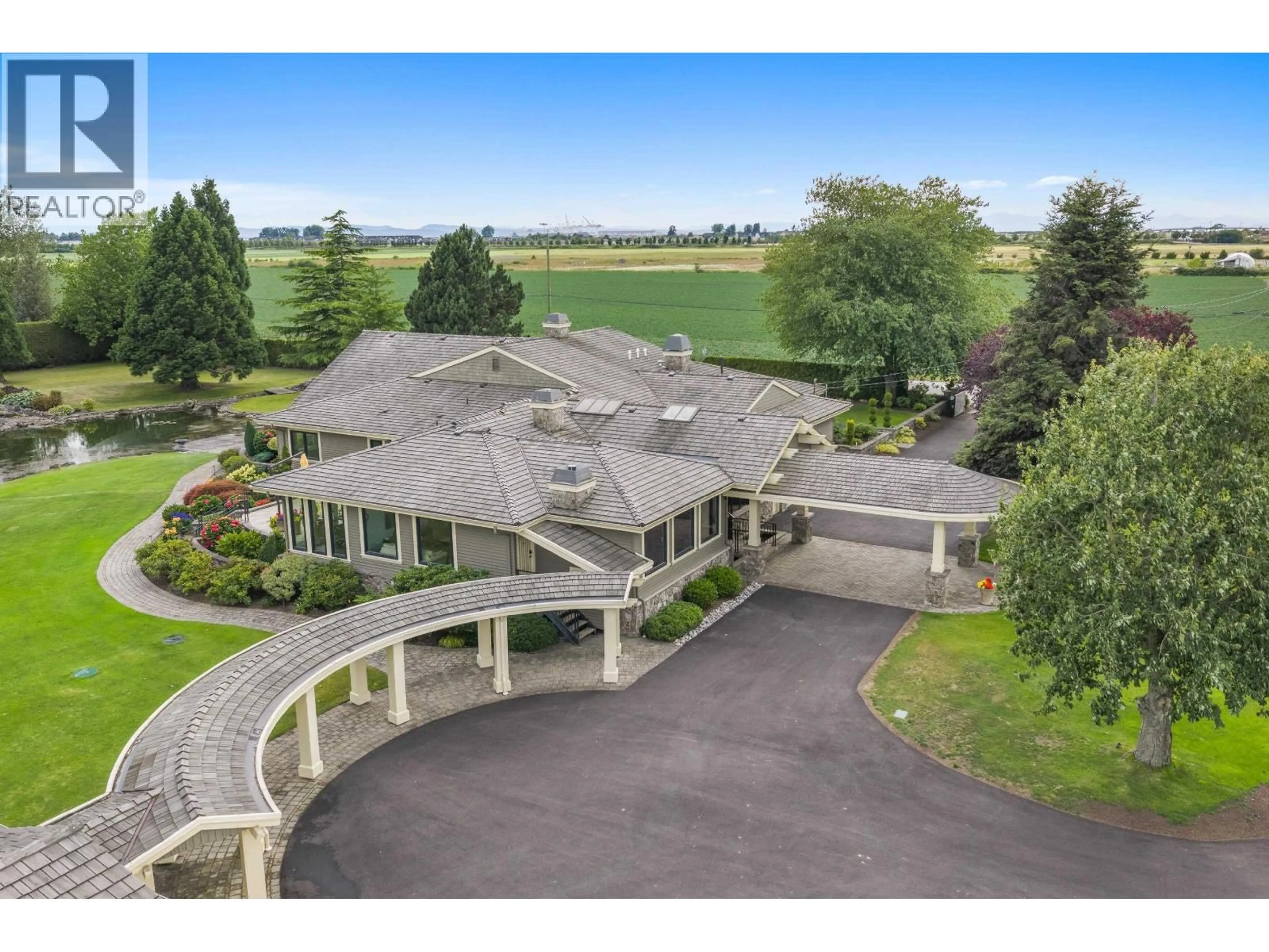 A pic from outside/outdoor area/front of a property/back of a property/a pic from drone, mountain view for 2750 52 STREET, Delta British Columbia V4M4G8