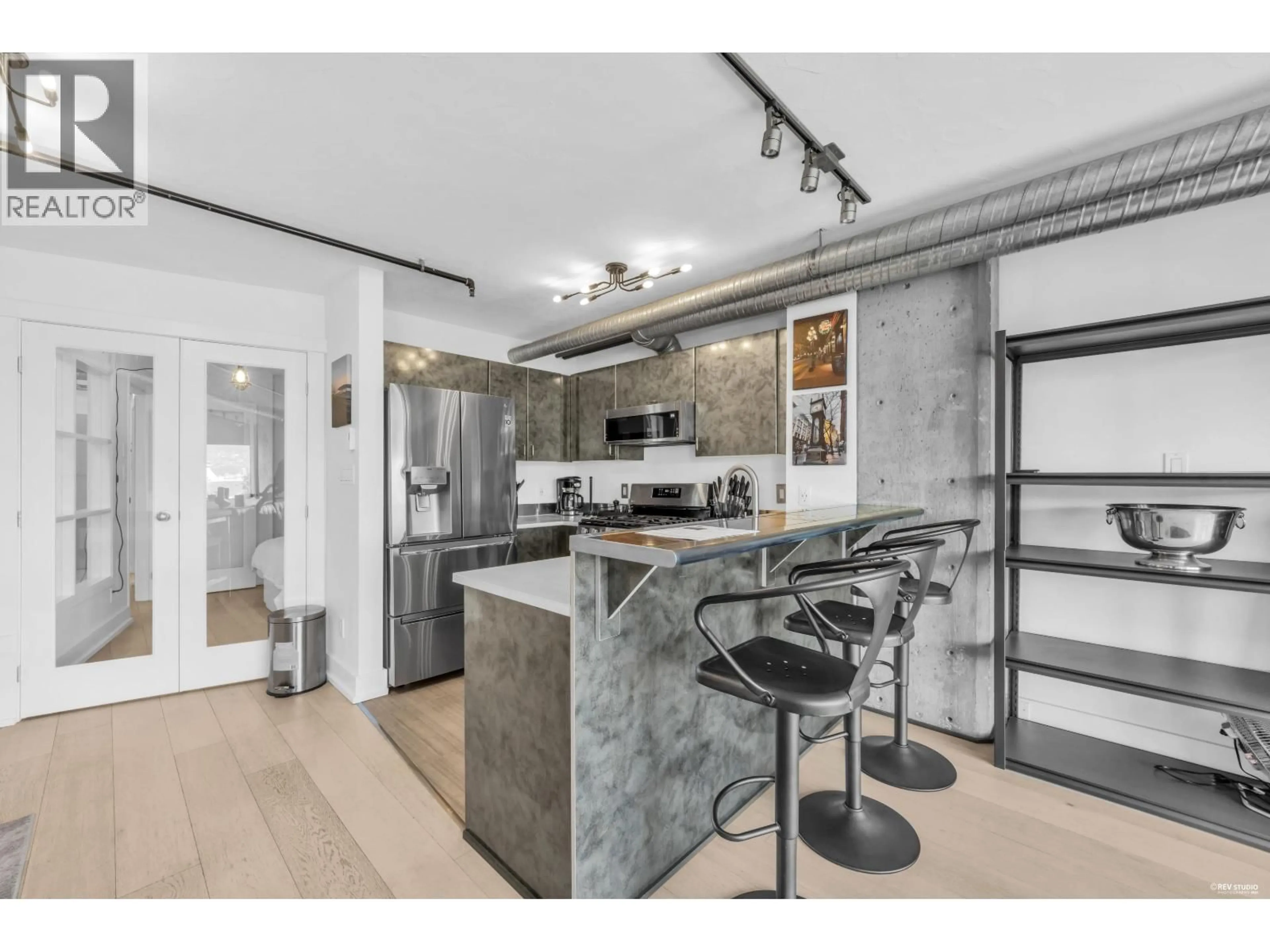 Open concept kitchen, unknown for 608 - 27 ALEXANDER STREET, Vancouver British Columbia V6A1B2