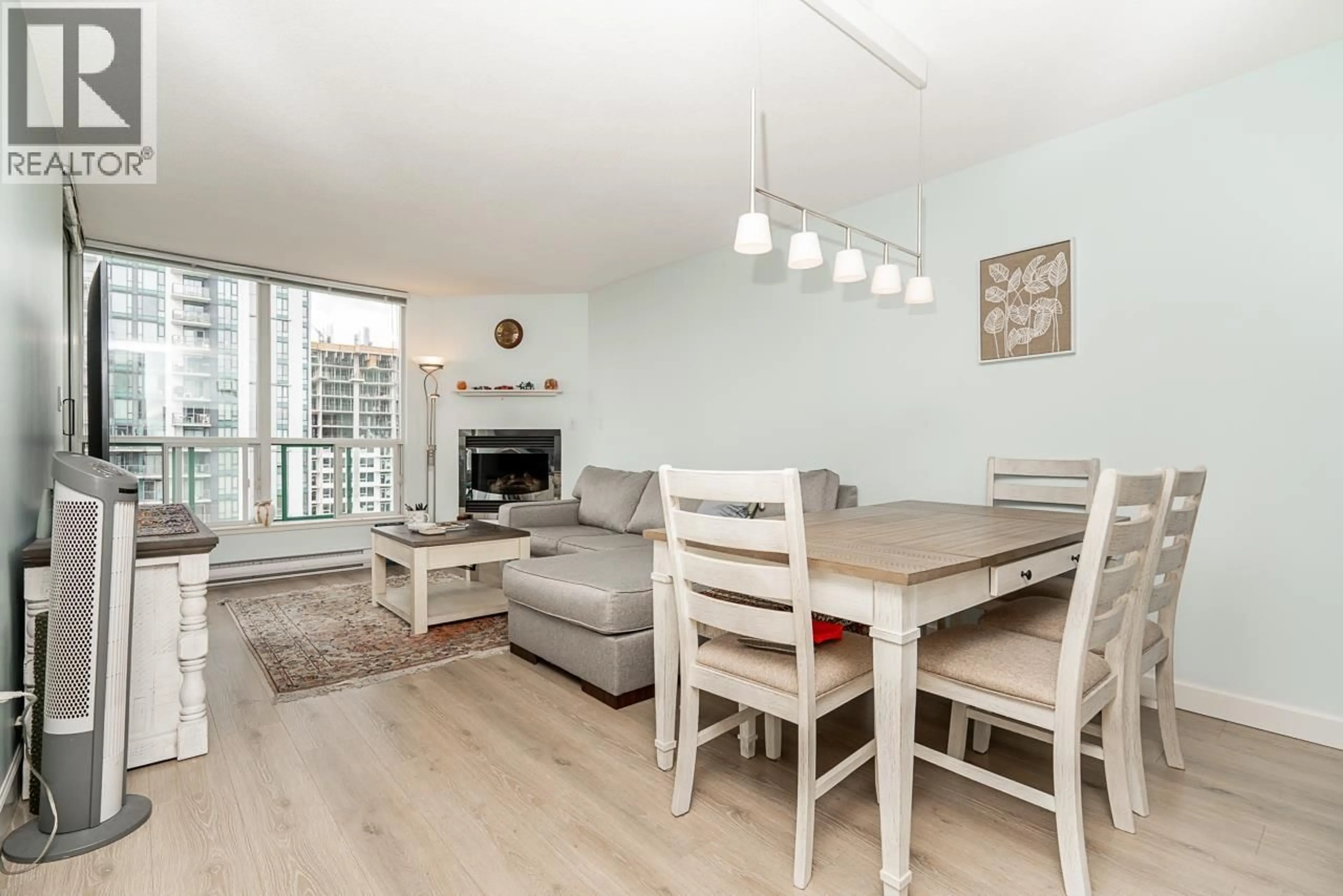 Living room with furniture, wood/laminate floor for 1705 - 1148 HEFFLEY CRESCENT, Coquitlam British Columbia V3B8A6