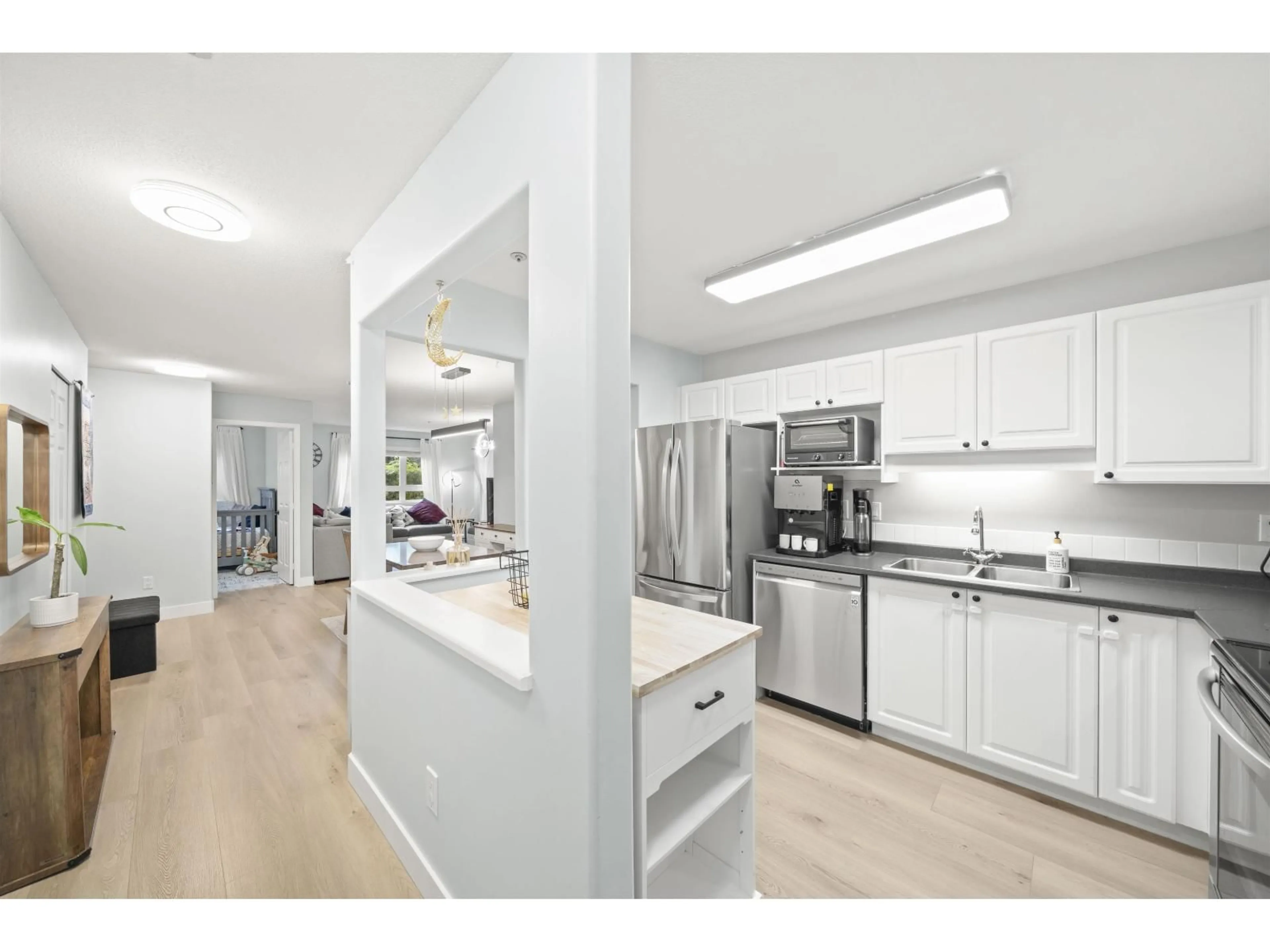 Open concept kitchen, unknown for 103 - 20189 54 AVENUE, Langley British Columbia V3A3W2