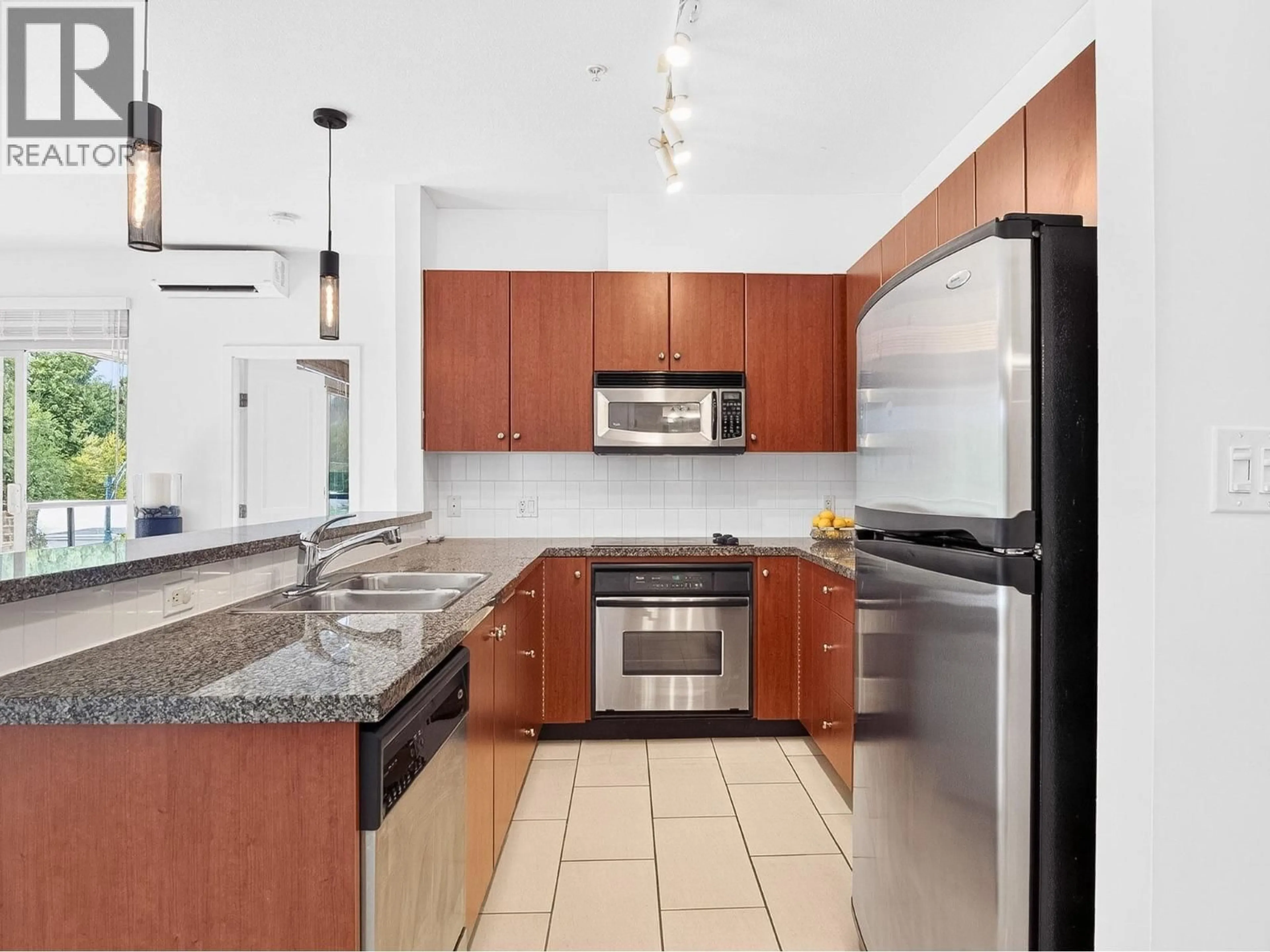 Standard kitchen, ceramic/tile floor for 304 - 100 CAPILANO ROAD, Port Moody British Columbia V3H5M9