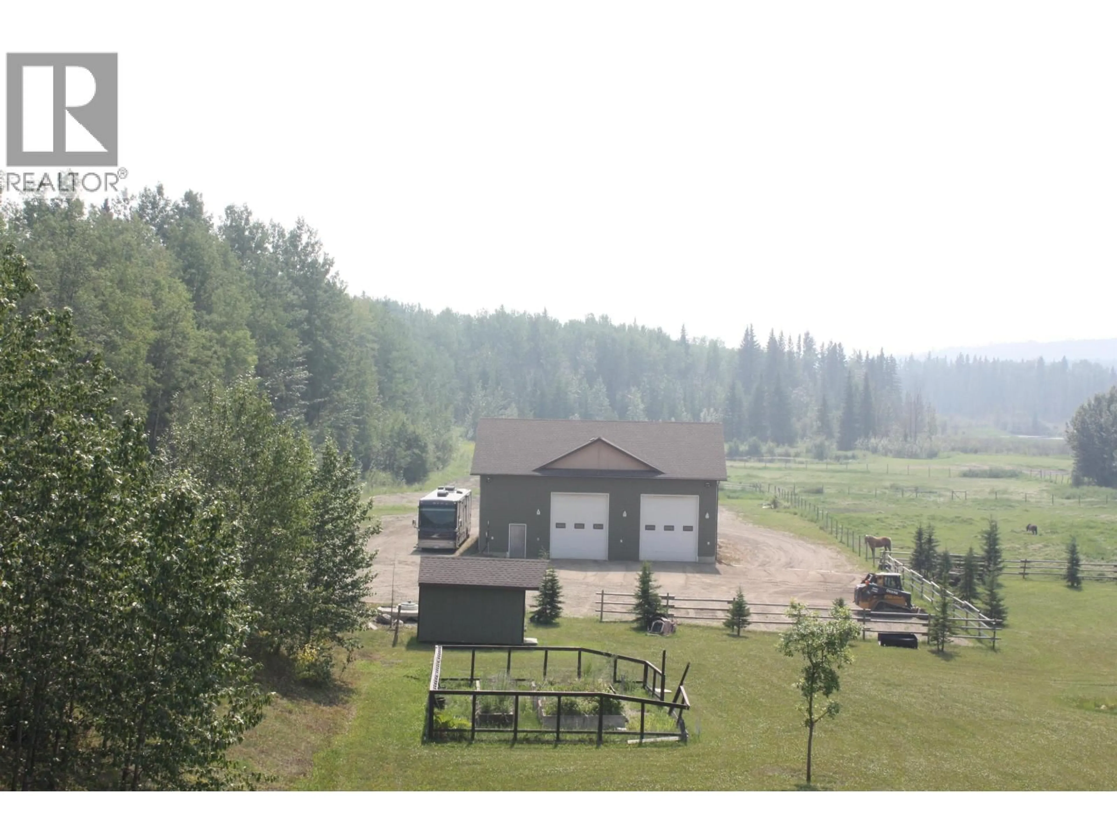 A pic from outside/outdoor area/front of a property/back of a property/a pic from drone, forest/trees view for 13395 WRIGHT ROAD, Charlie Lake British Columbia V1J8G9