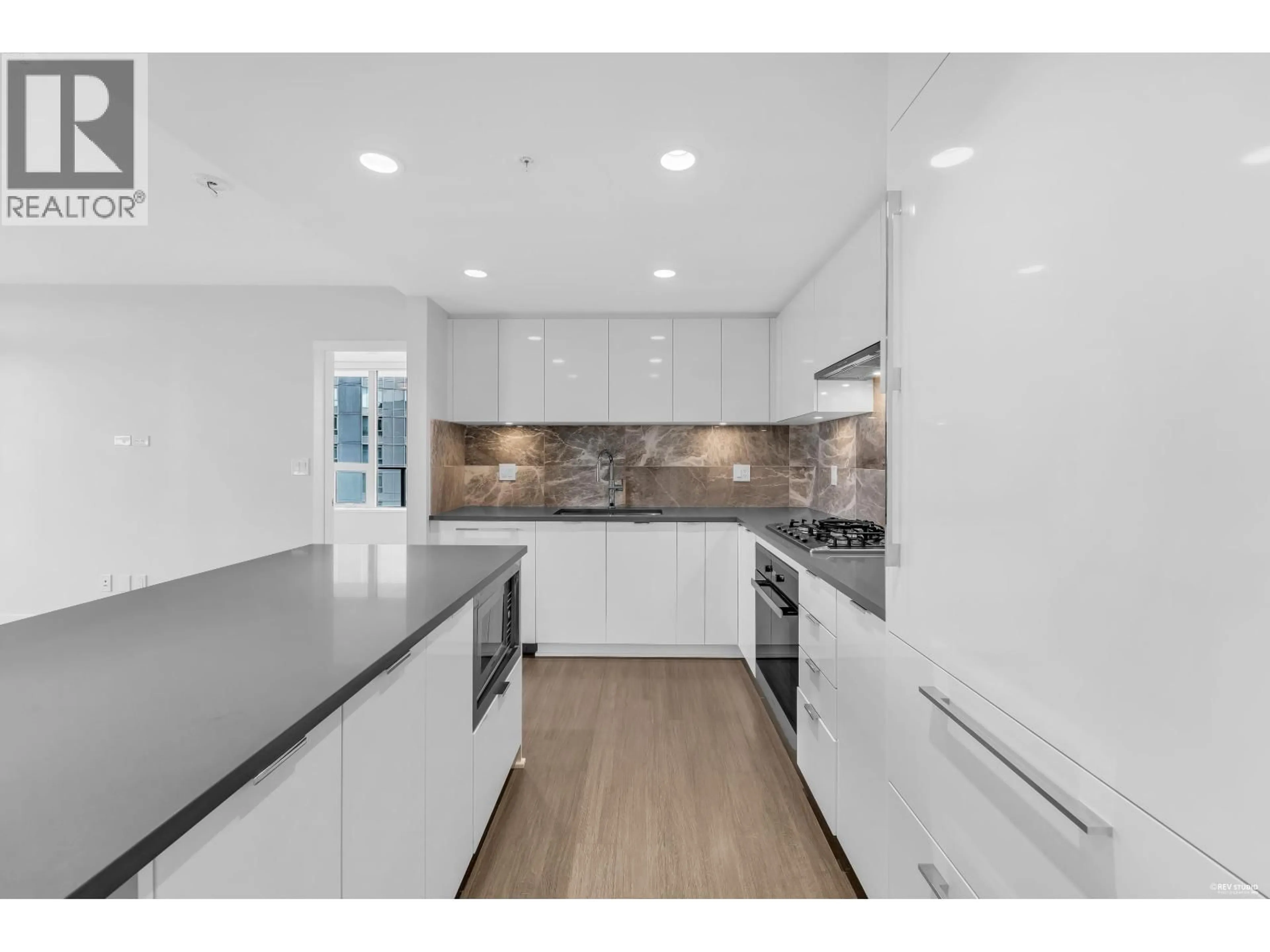 Open concept kitchen, unknown for 1107 - 3699 SEXSMITH ROAD, Richmond British Columbia V6X0W4