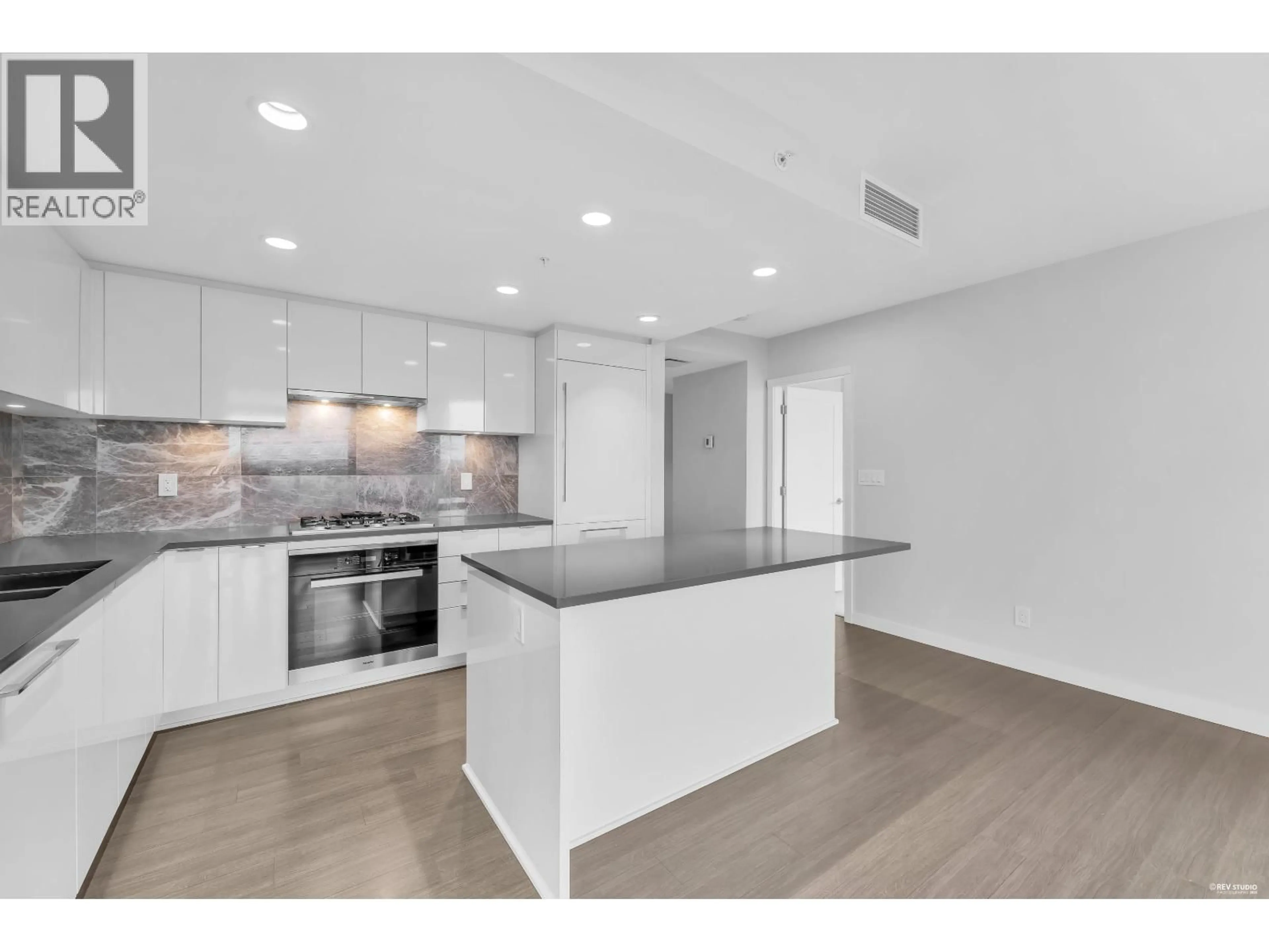Open concept kitchen, unknown for 1107 - 3699 SEXSMITH ROAD, Richmond British Columbia V6X0W4