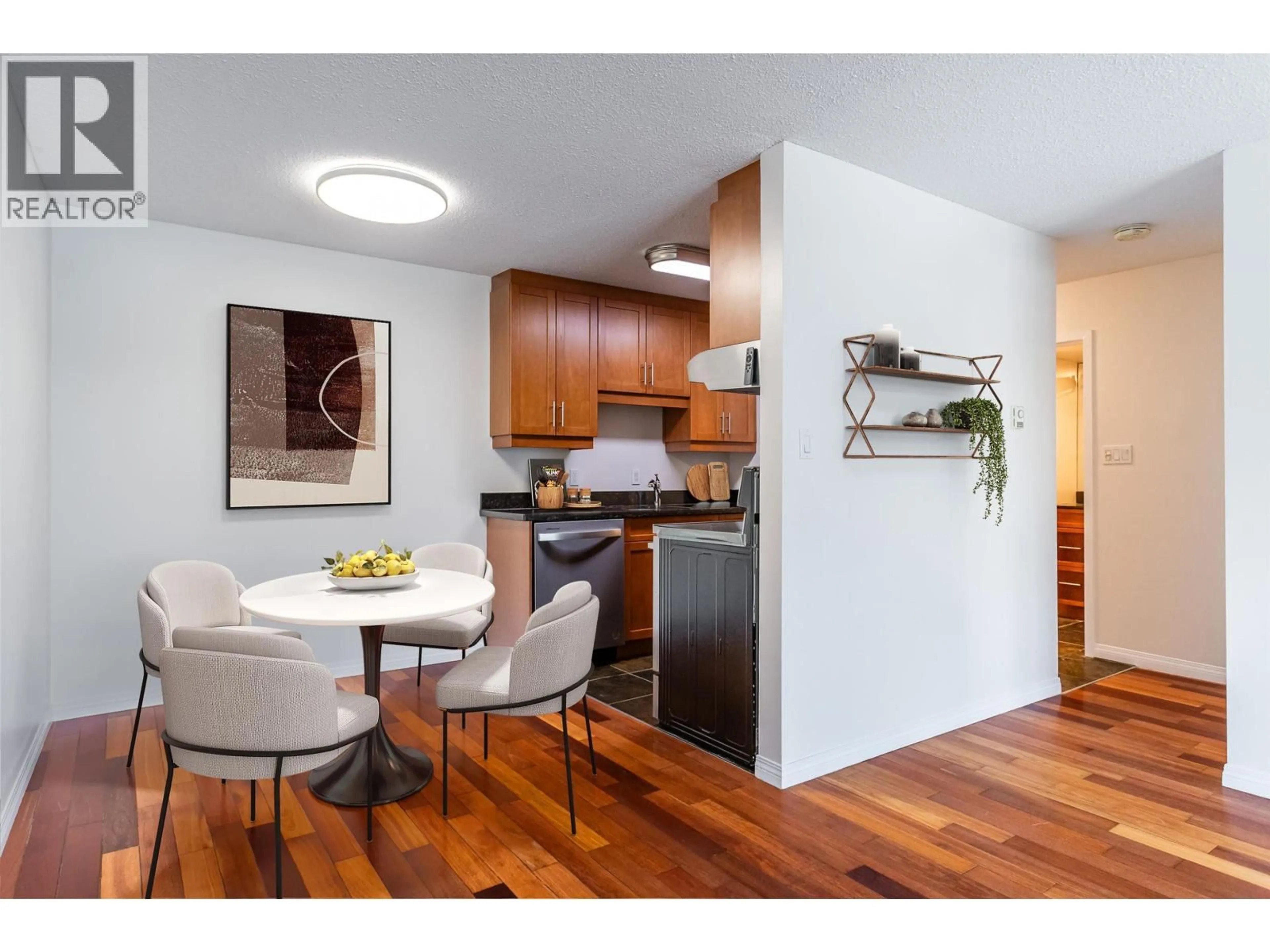 Open concept kitchen, wood/laminate floor for 209 - 275 2ND STREET, North Vancouver British Columbia V7M1C9
