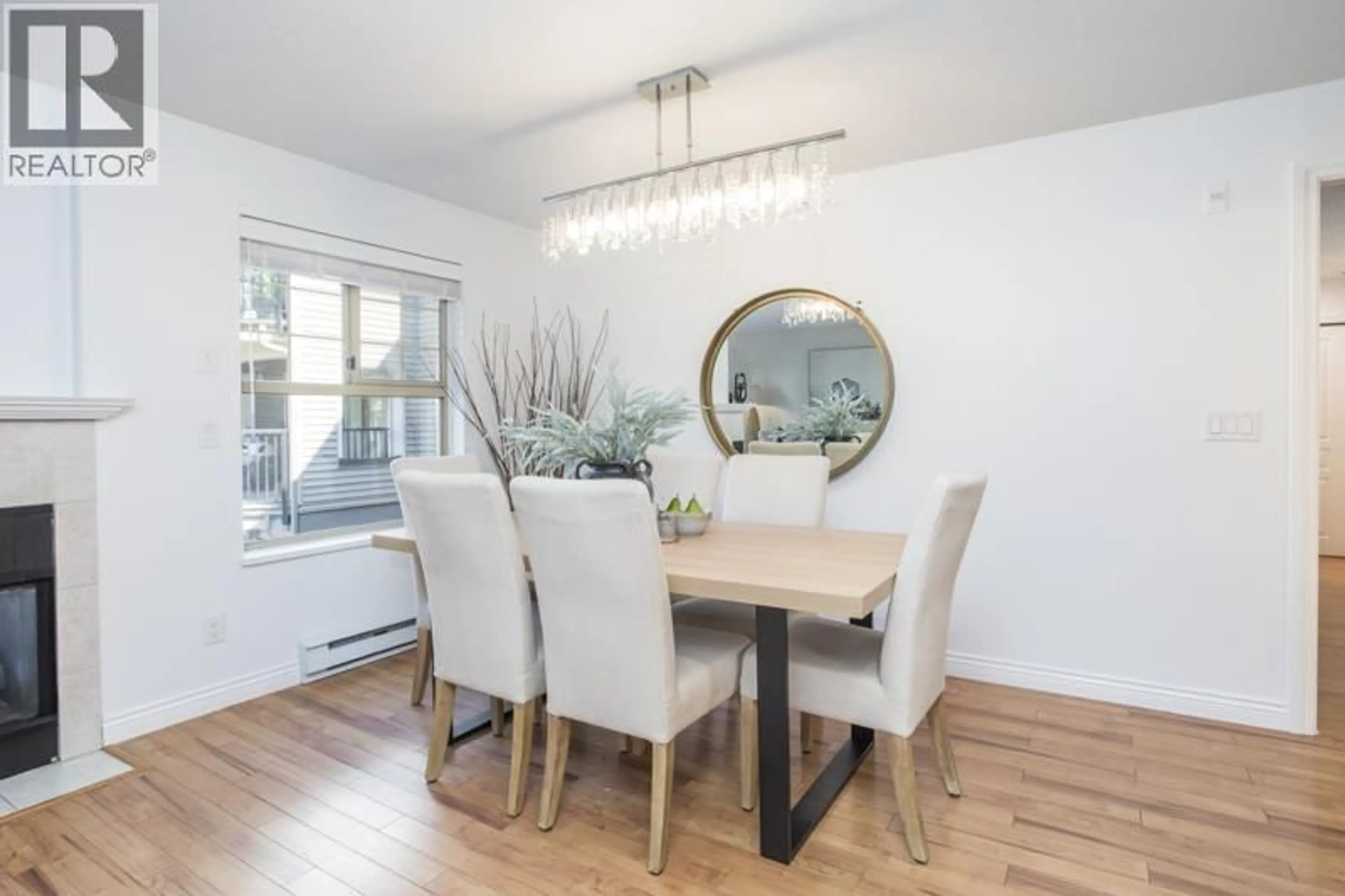 Dining room, wood/laminate floor for 310 - 211 TWELFTH STREET, New Westminster British Columbia V3M4H4