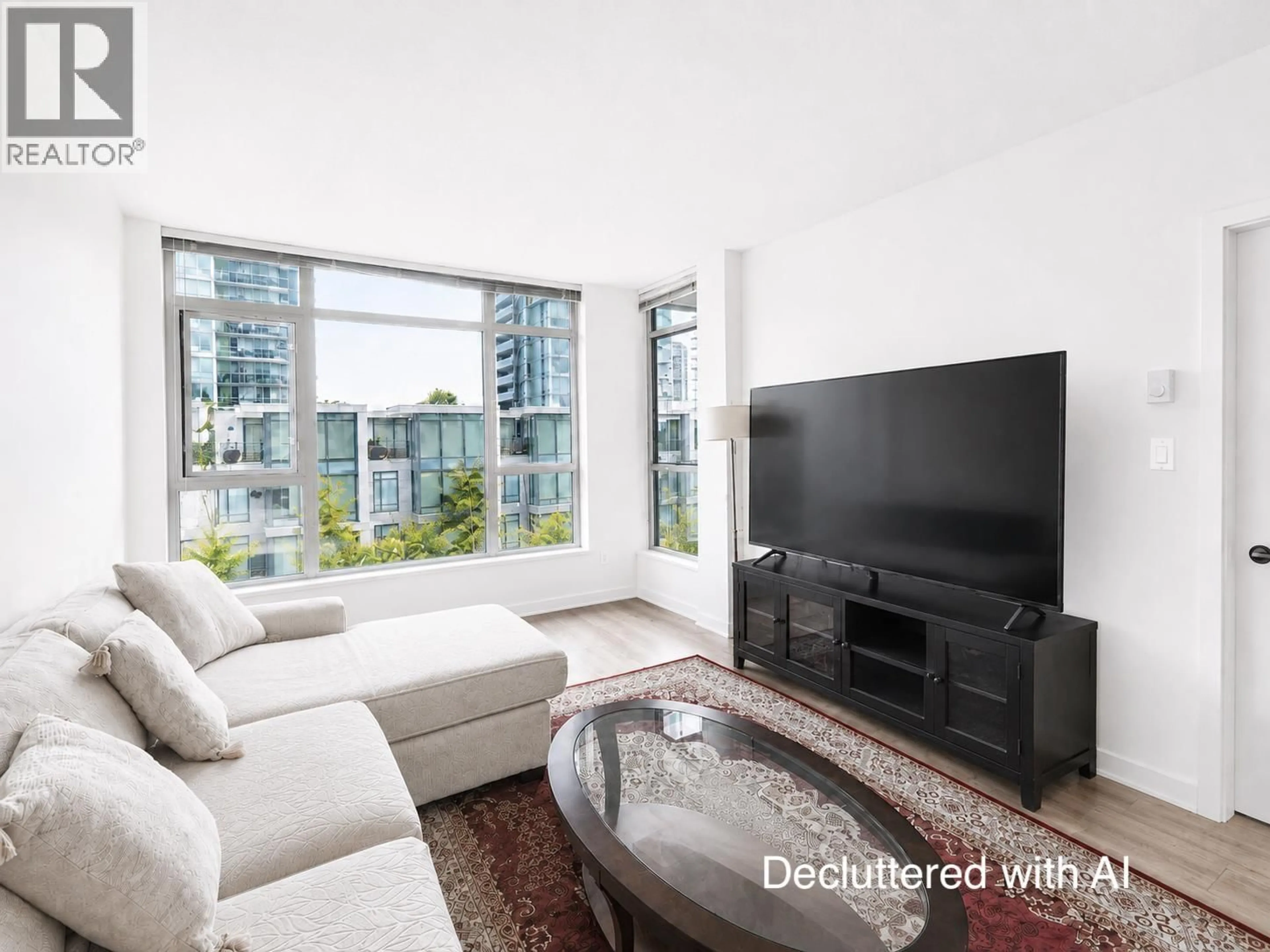 Living room with furniture, unknown for 302 - 4900 LENNOX LANE, Burnaby British Columbia V5H0G9