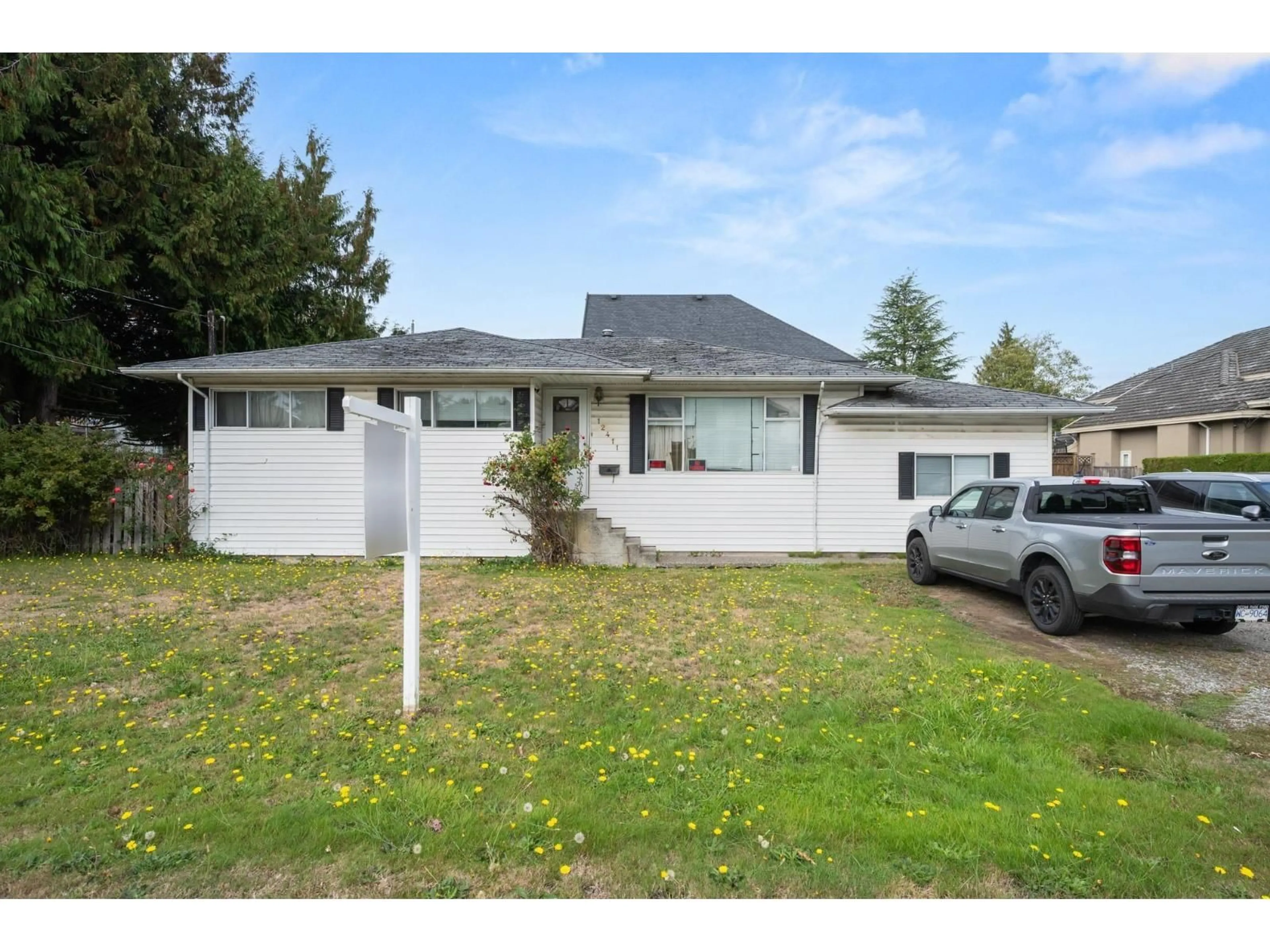 Home with vinyl exterior material, street for 12411 78 AVENUE, Surrey British Columbia V3W2X5