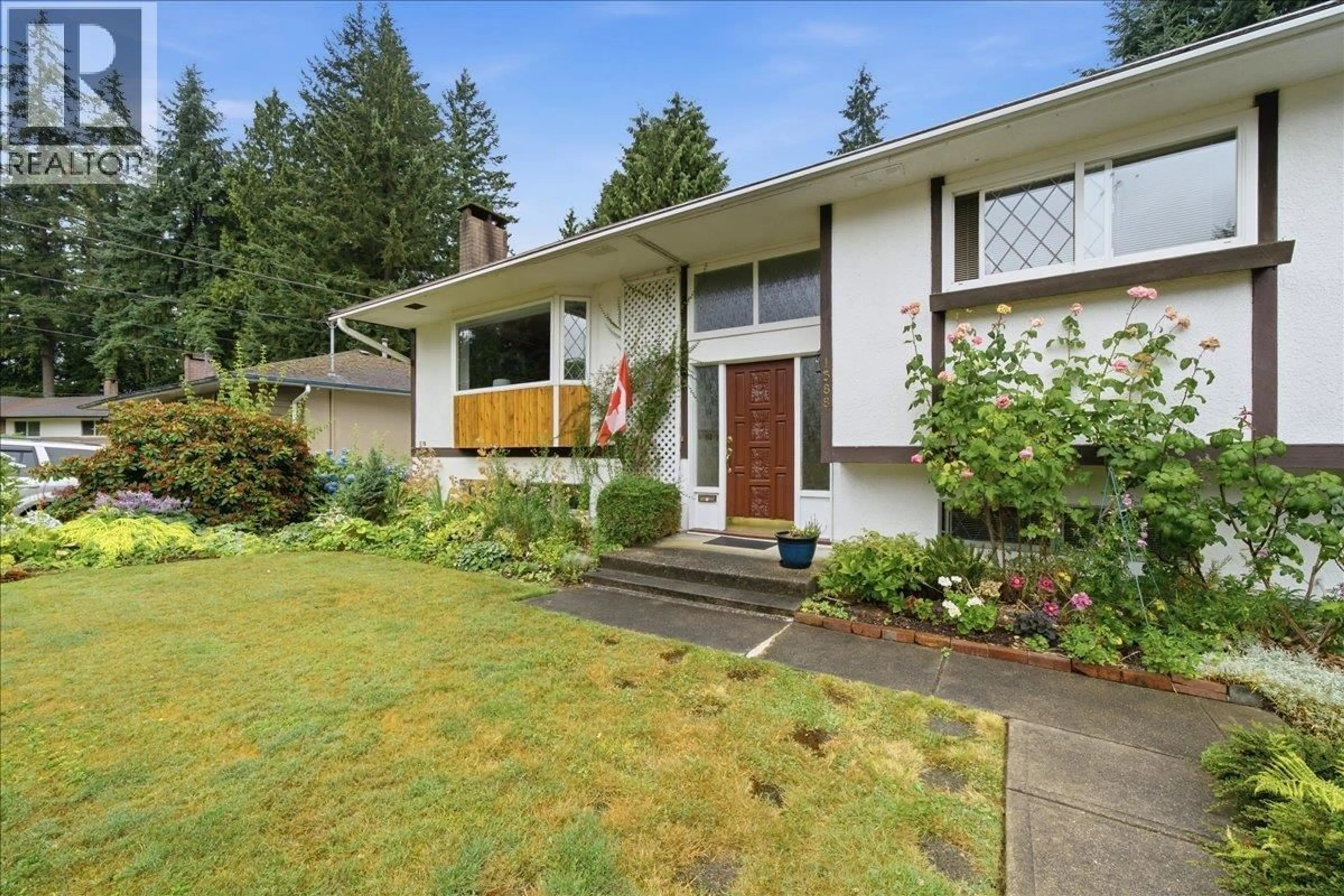 Home with vinyl exterior material, street for 1388 CAMBRIDGE DRIVE, Coquitlam British Columbia V3J2P7