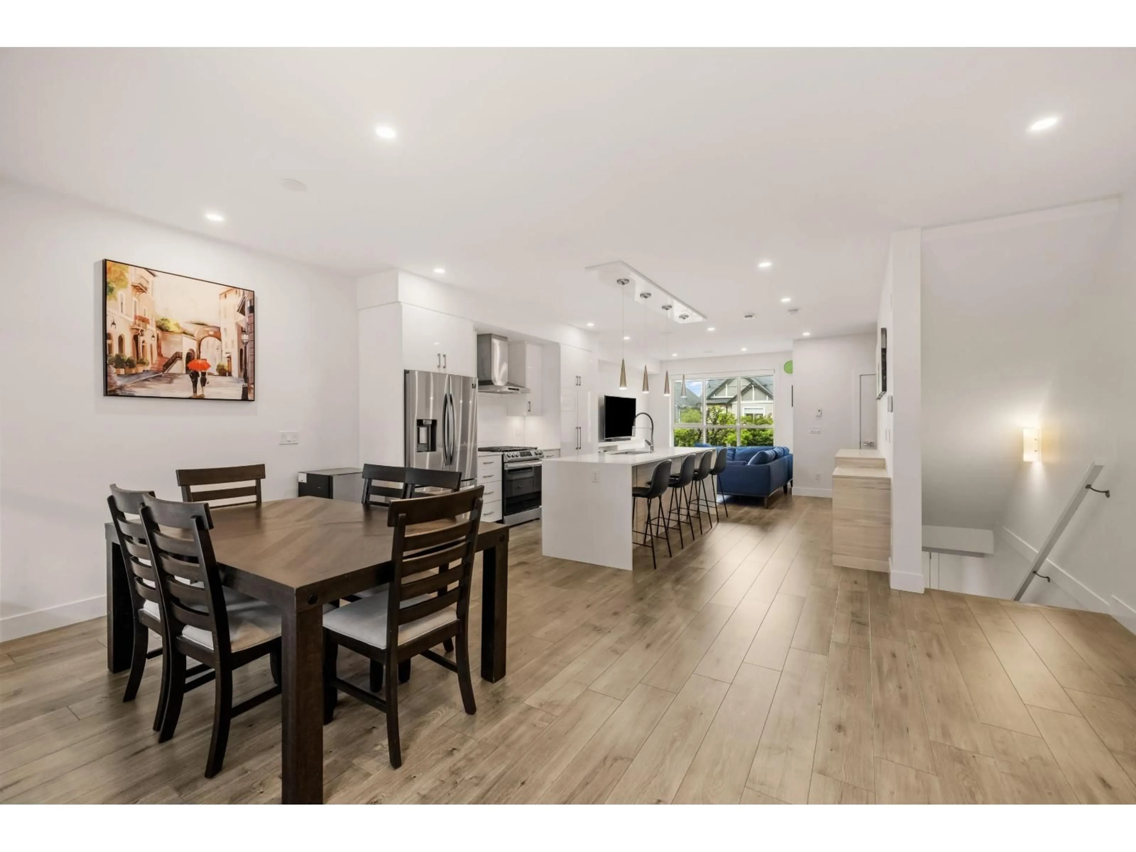 Open concept kitchen, wood/laminate floor for 24 - 7177 194A STREET, Surrey British Columbia V4N1N3