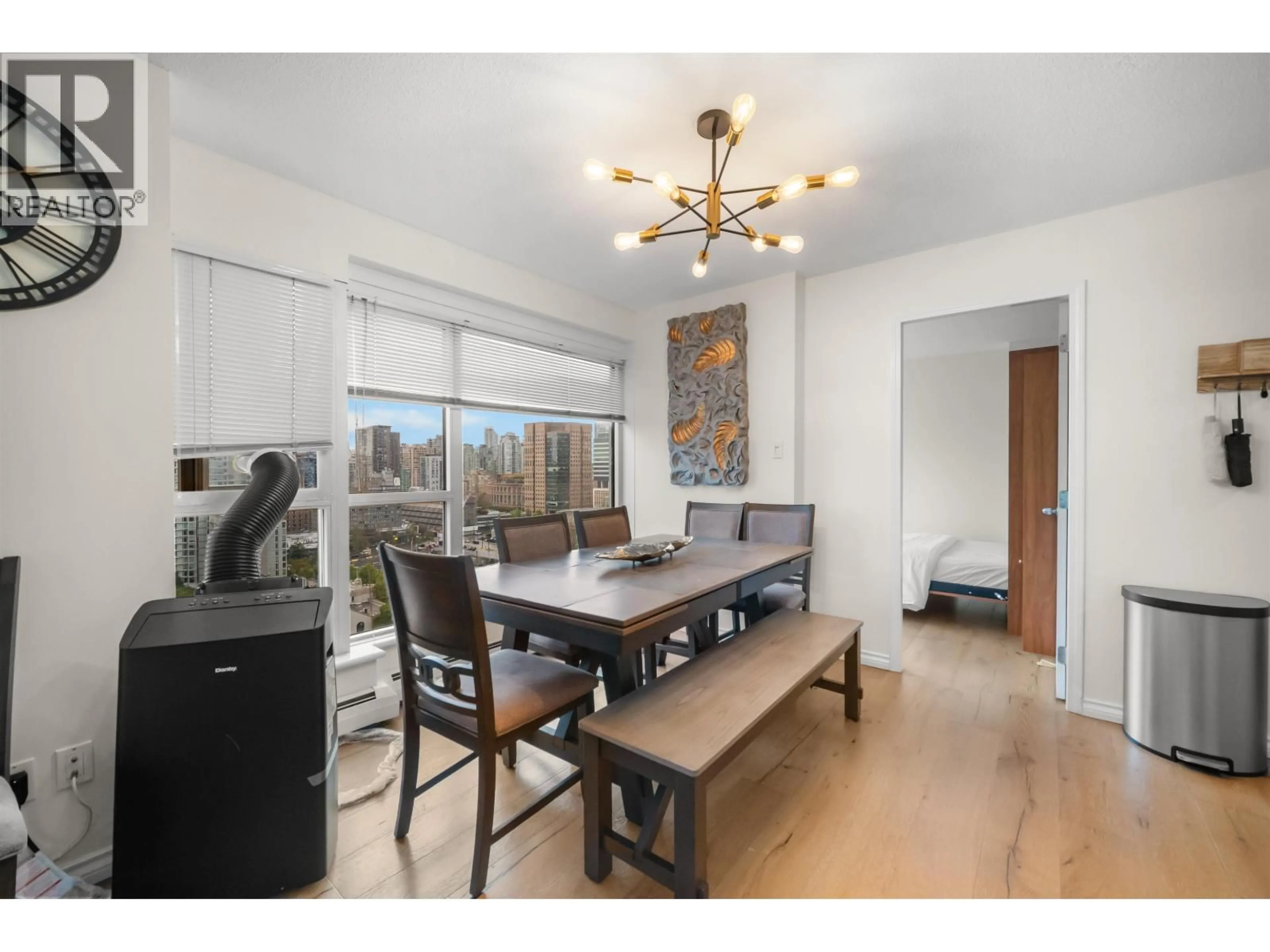 Dining room, wood/laminate floor for 2204 - 183 KEEFER PLACE, Vancouver British Columbia V6B6B9